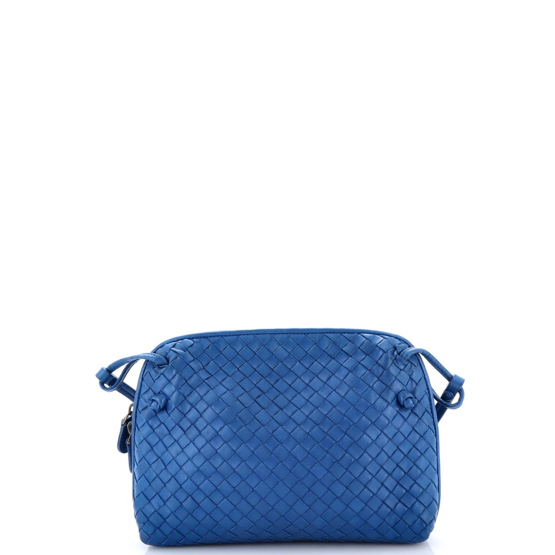 Bottega Veneta Nodini Crossbody Bag Intrecciato Nappa: The Bottega Veneta Nodini Crossbody Bag, cut in Intrecciato Nappa, a small woven crossbody with a slim adjustable strap. Thin strap, small woven body, nothing extra - it is the quietest bag in the lin