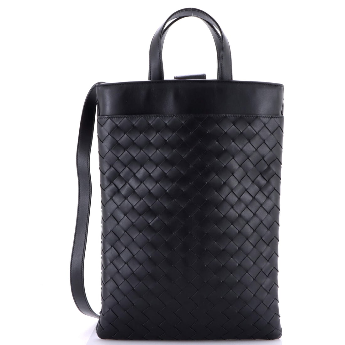 Bottega Veneta Laptop Case with Handle Intrecciato Nappa: The Laptop Case with Handle in Intrecciato Nappa, a boxed body with a wide opening and a top handle. There is no logo - the weave does the identifying, which has always been Bottega's argument. The fo