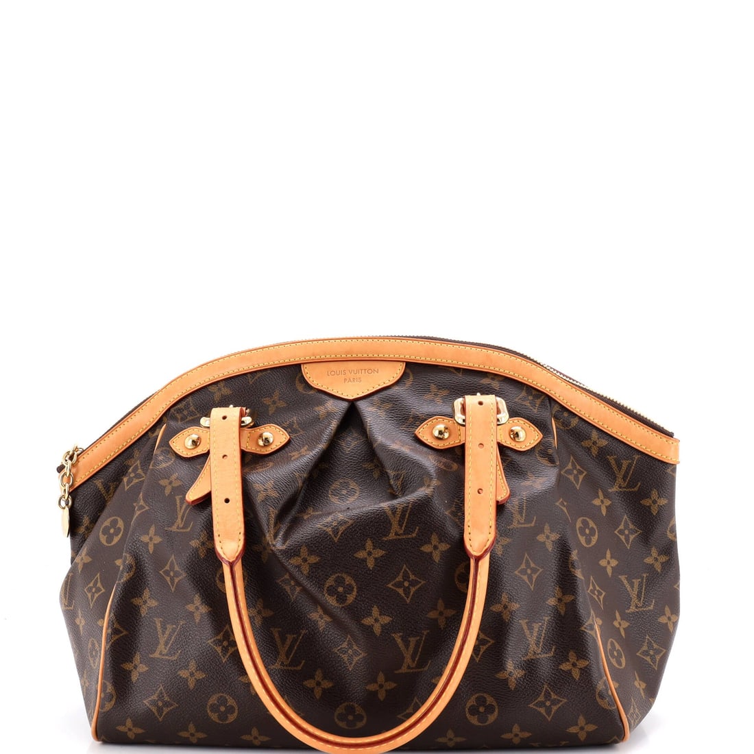 Louis Vuitton Tivoli Handbag Monogram Canvas: Louis Vuitton Tivoli Handbag, built in Monogram Canvas, a rounded shoulder body with pleated sides and a top zip. The pleated side panels are the Tivoli's signature and they are worth inspecting on