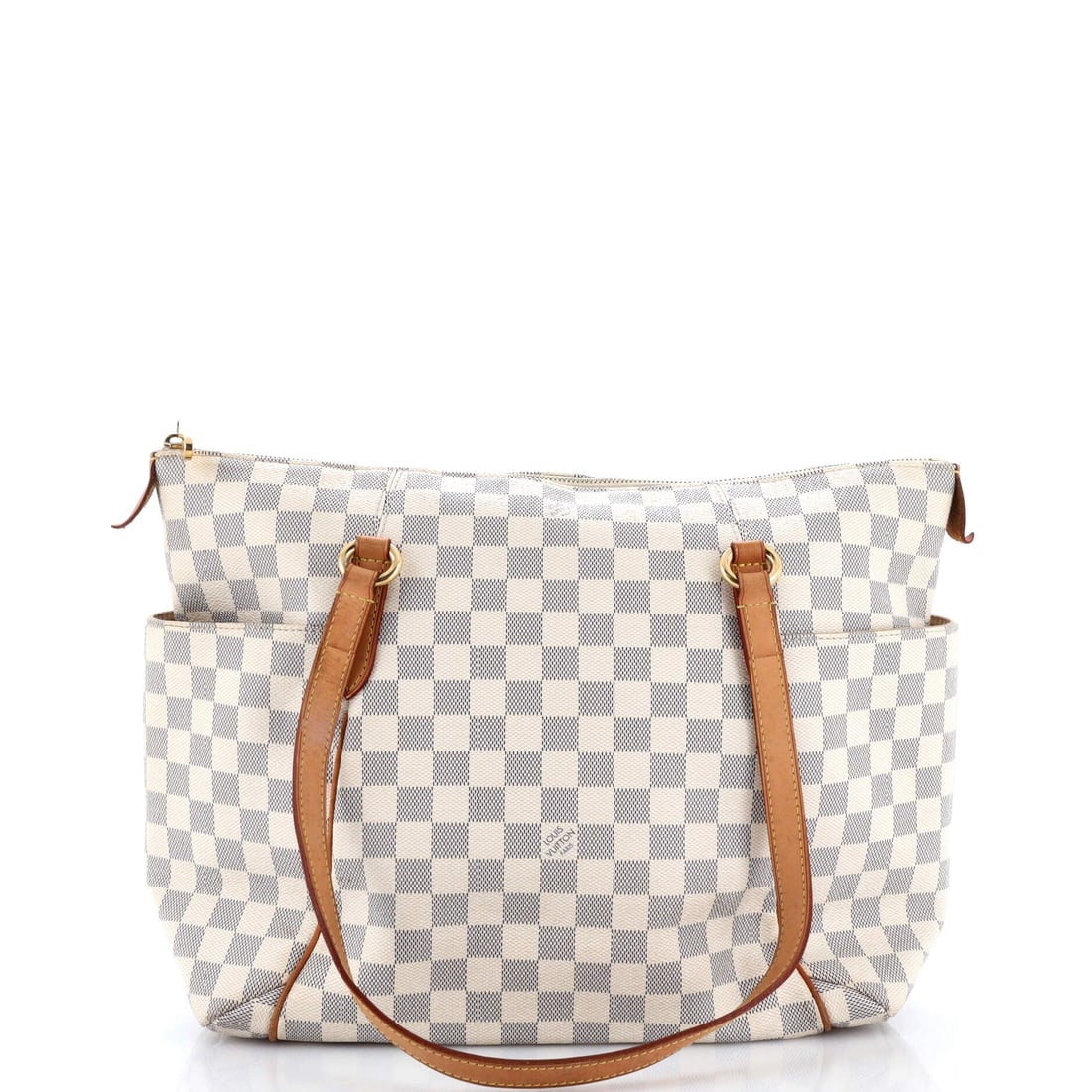 Louis Vuitton Totally Handbag Damier: This Totally Handbag comes in Damier, a soft open tote with flat handles and a wide mouth. An open top and long handles make it a genuine daily carrier. It measures 13" W x 11.5" H x 6" D. Condition