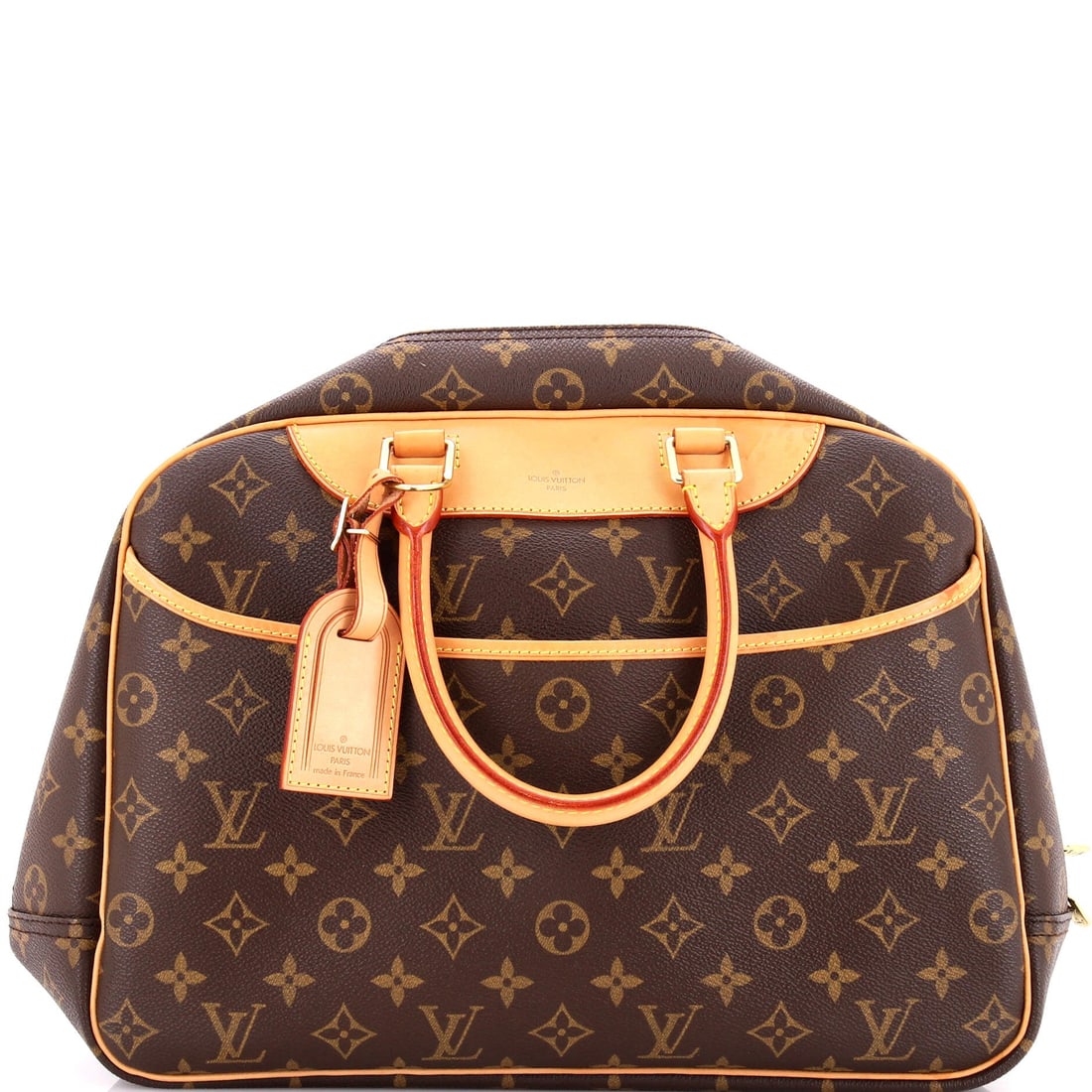Louis Vuitton Deauville Handbag Monogram Canvas: Louis Vuitton's Deauville Handbag in Monogram Canvas - a balanced silhouette that carries without bulk. Stitching and edge finishing are the tells at this level, and both read cleanly. Scale is 13.5"