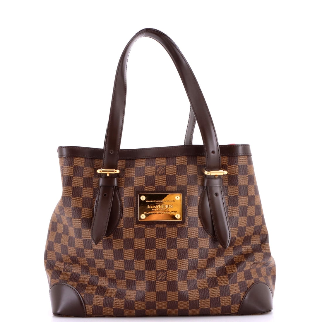 Louis Vuitton Hampstead Handbag Damier: The Hampstead Handbag in Damier, a squared shoulder tote with flat handles and a zip top. The Hampstead is the closed-top answer to the Neverfull, and the zip is the reason people choose it. 14" wide,