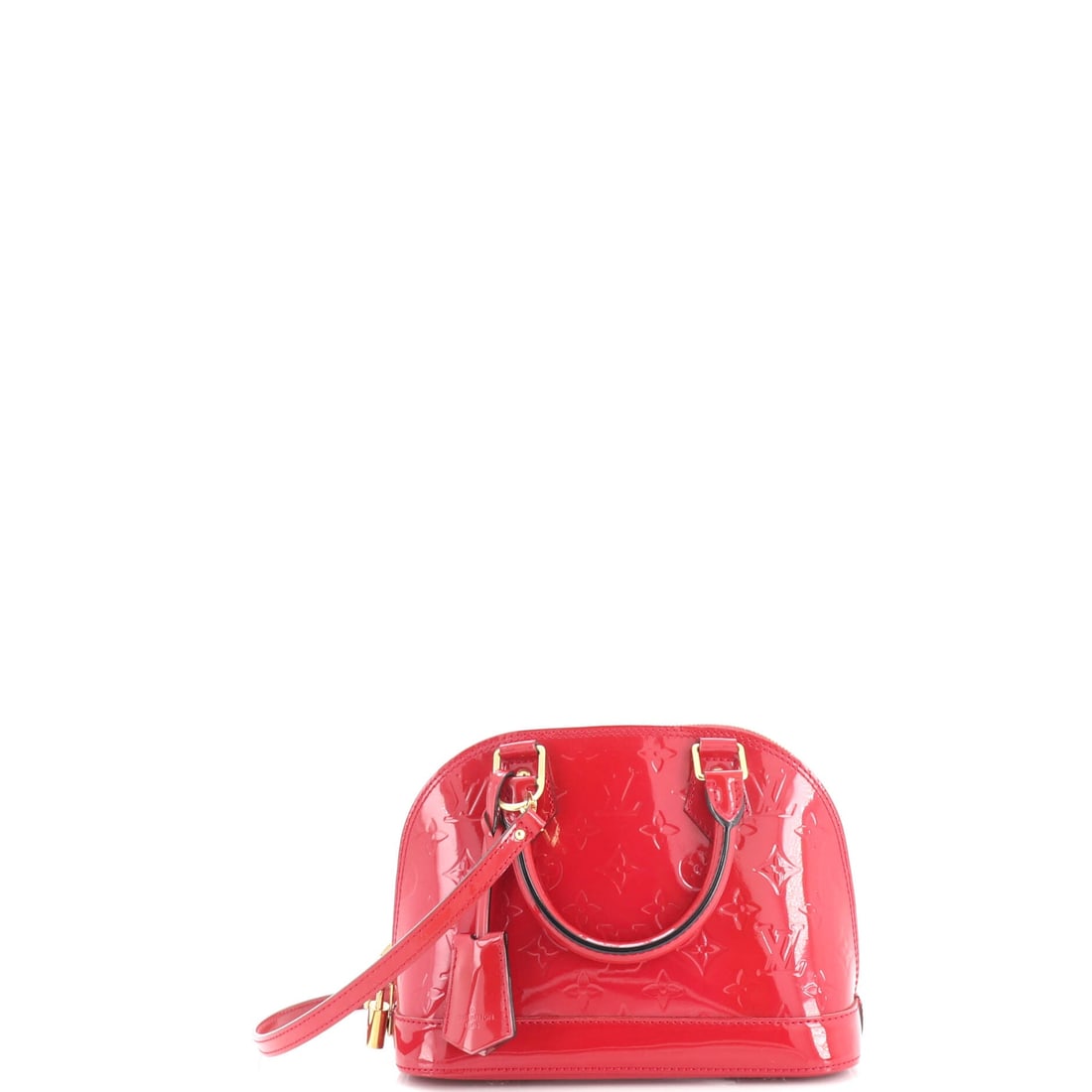 Louis Vuitton Alma Handbag Monogram Vernis: Louis Vuitton Alma Handbag, built in Monogram Vernis, the shell shape that holds its posture whether full or empty. It carries formally without reading as a briefcase, which is a narrow line to walk. 