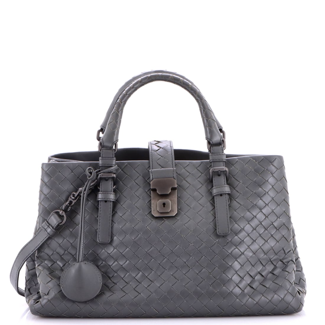 Bottega Veneta Roma Bag Intrecciato Nappa: The Intrecciato Nappa Roma Bag, Bottega Veneta, a soft Intrecciato tote with rolled handles and an open top. The wide, low body sits under the arm without pulling the shoulder. Sized at 12" W, 8" H, 6