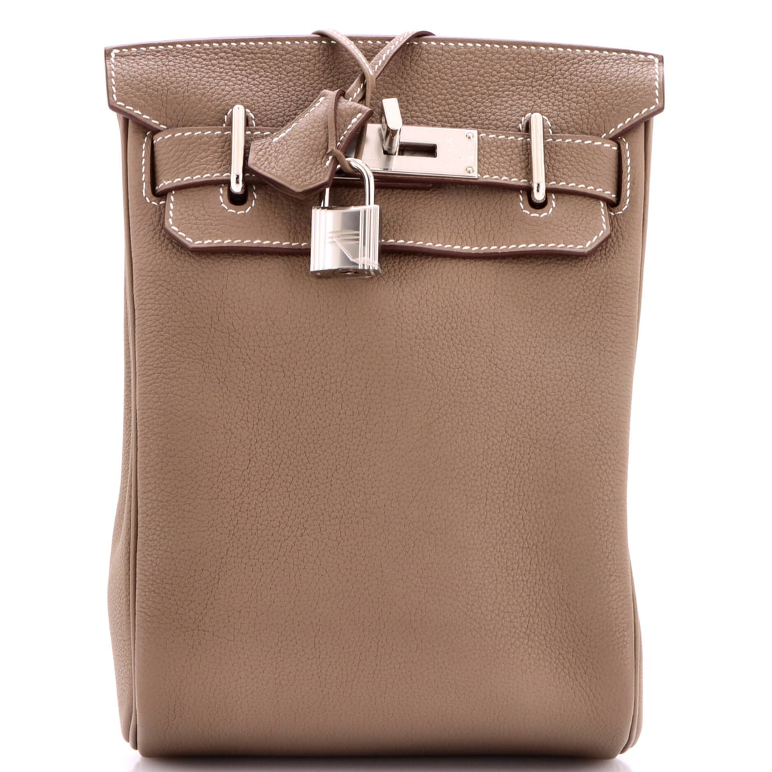 Hermes Hac a Dos Backpack Togo: 7"W x 11"H x 3"D. Hac a Dos PM in Togo, a backpack built on Hermes saddlery logic rather than sportswear. Taller than it is wide, it sits close to the spine, and Togo's grain takes strap pressure with