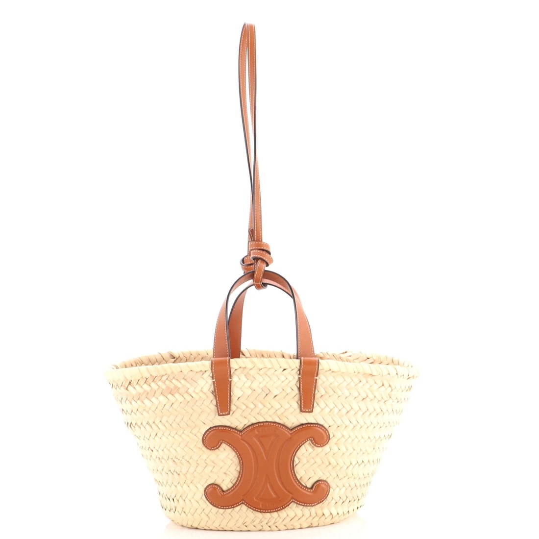 Celine Triomphe Basket Shoulder Bag Raffia with Leather Teen: Raffia is the material that makes a luxury bag look like it has somewhere better to be, and the Triomphe Basket in the Teen size uses it well. Woven raffia - palm fiber, dried and hand-plaited - forms