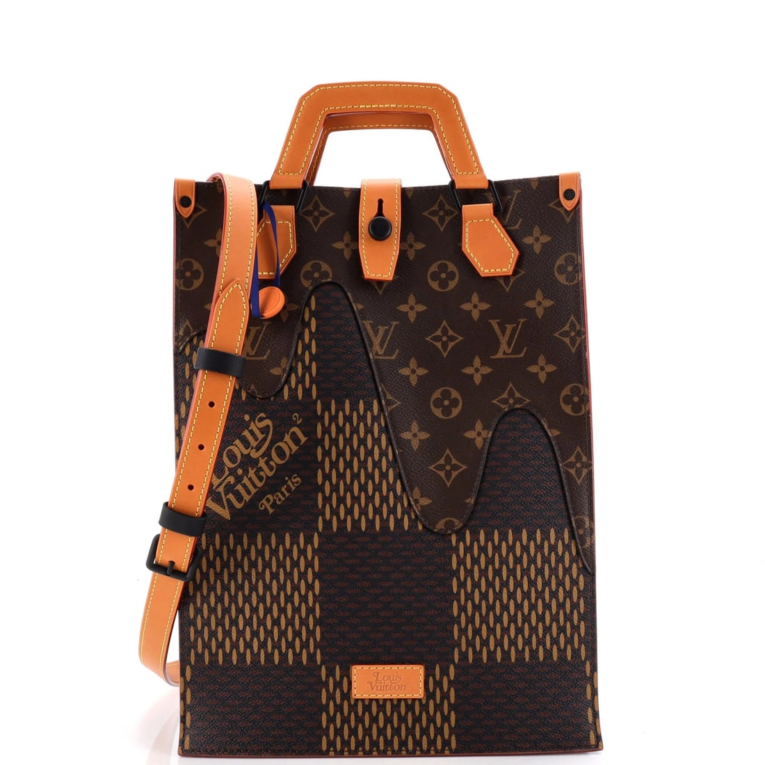 Goyard Saint Louis Reversible Tote Coated Canvas and Printed Canvas PM: Reversible construction is the quiet luxury of this Saint Louis: one side carries the Goyardine chevron, the hand-painted canvas the house is known for, and the other a printed canvas that changes