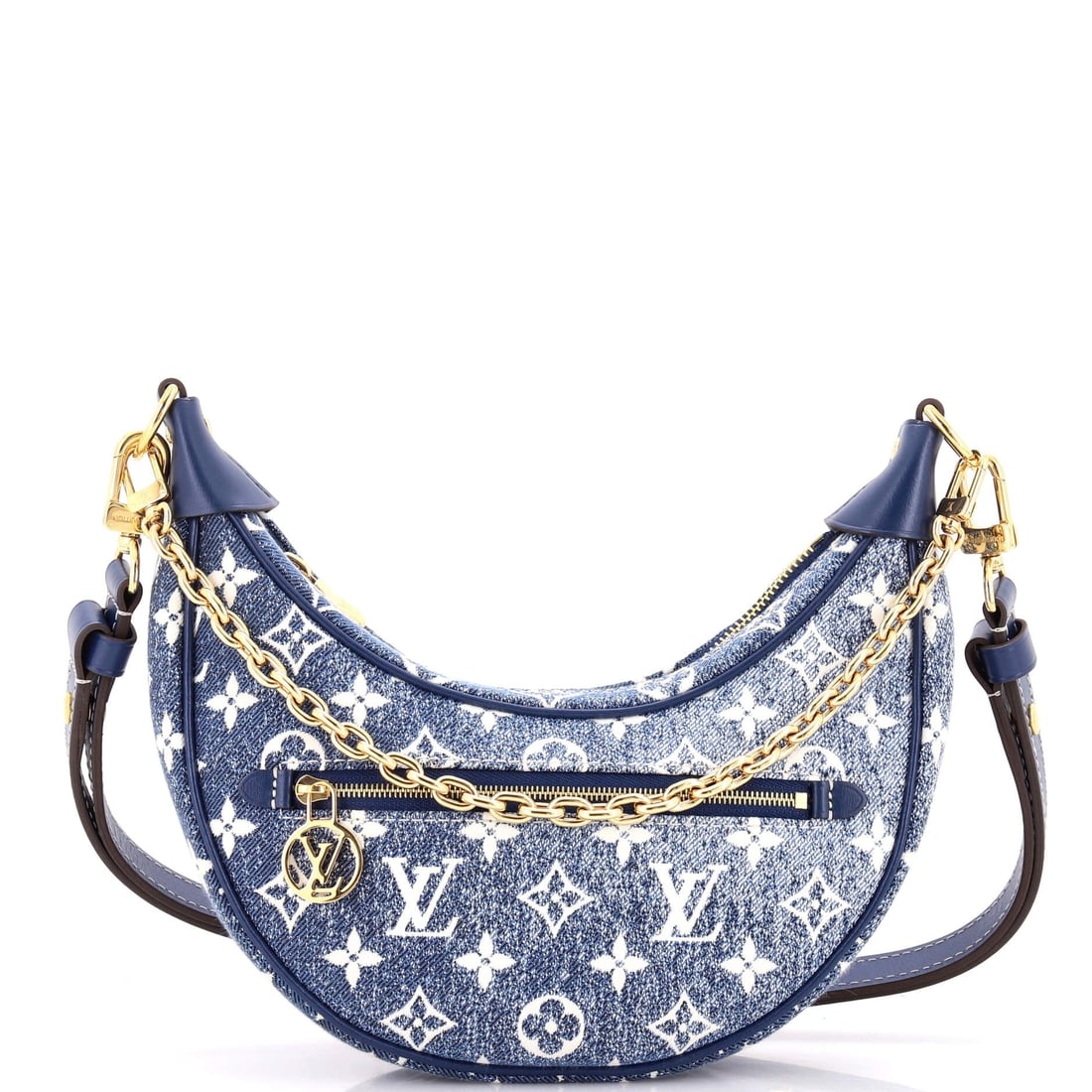 Celine Triomphe Shoulder Bag Smooth Calfskin Medium: In smooth calfskin the Triomphe is at its most severe, a plain box of a bag with nothing on the surface but the clasp. Medium measures 8 inches wide, 6 high and 3 deep, deep enough to hold a phone, a 