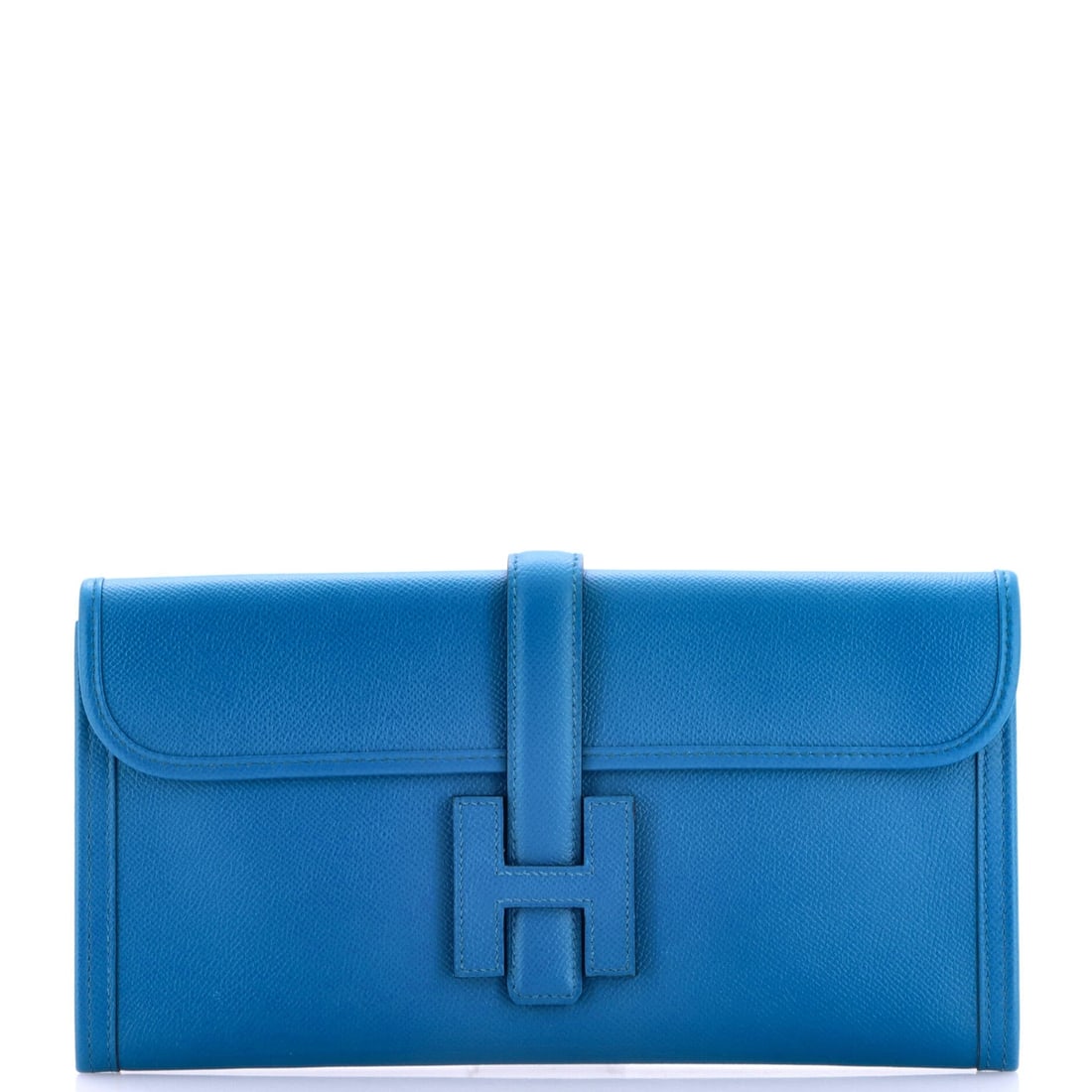 Hermes Jige Elan Clutch Epsom 29: Little on the Jige Elan announces itself: no clasp, no chain, no plate, just an H-shaped tab pushed through a leather loop to hold the front shut. Epsom is the fine embossed calfskin that keeps a cris