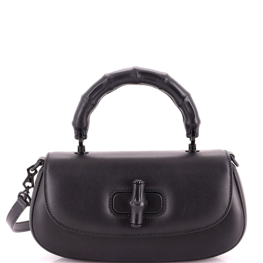 Gucci Bamboo Diva Top Handle Bag Leather Medium: Bamboo handles are Gucci's oldest signature, and the Bamboo Diva Top Handle Bag wears one above a black leather body about 10 inches wide, 5 tall and 3 deep. Collectors often note that the bamboo hand