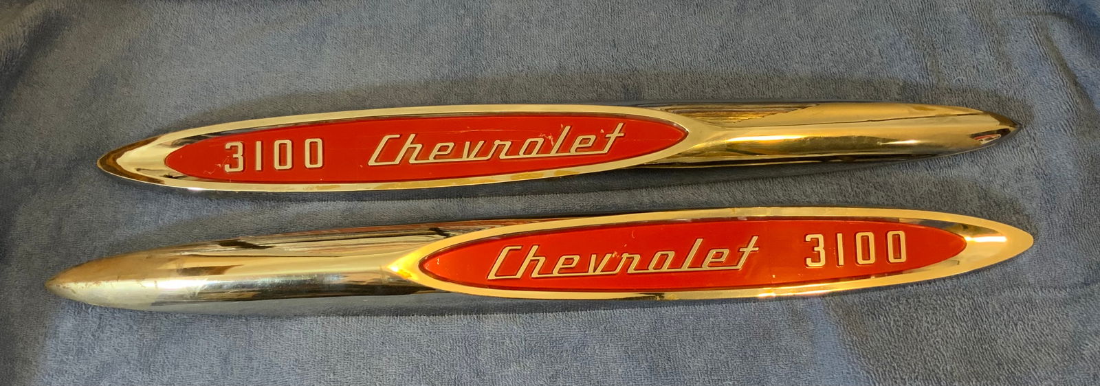 Two 1957 Chevrolet Truck 3100 front fender spear emblems RH and LH (1 of 6)