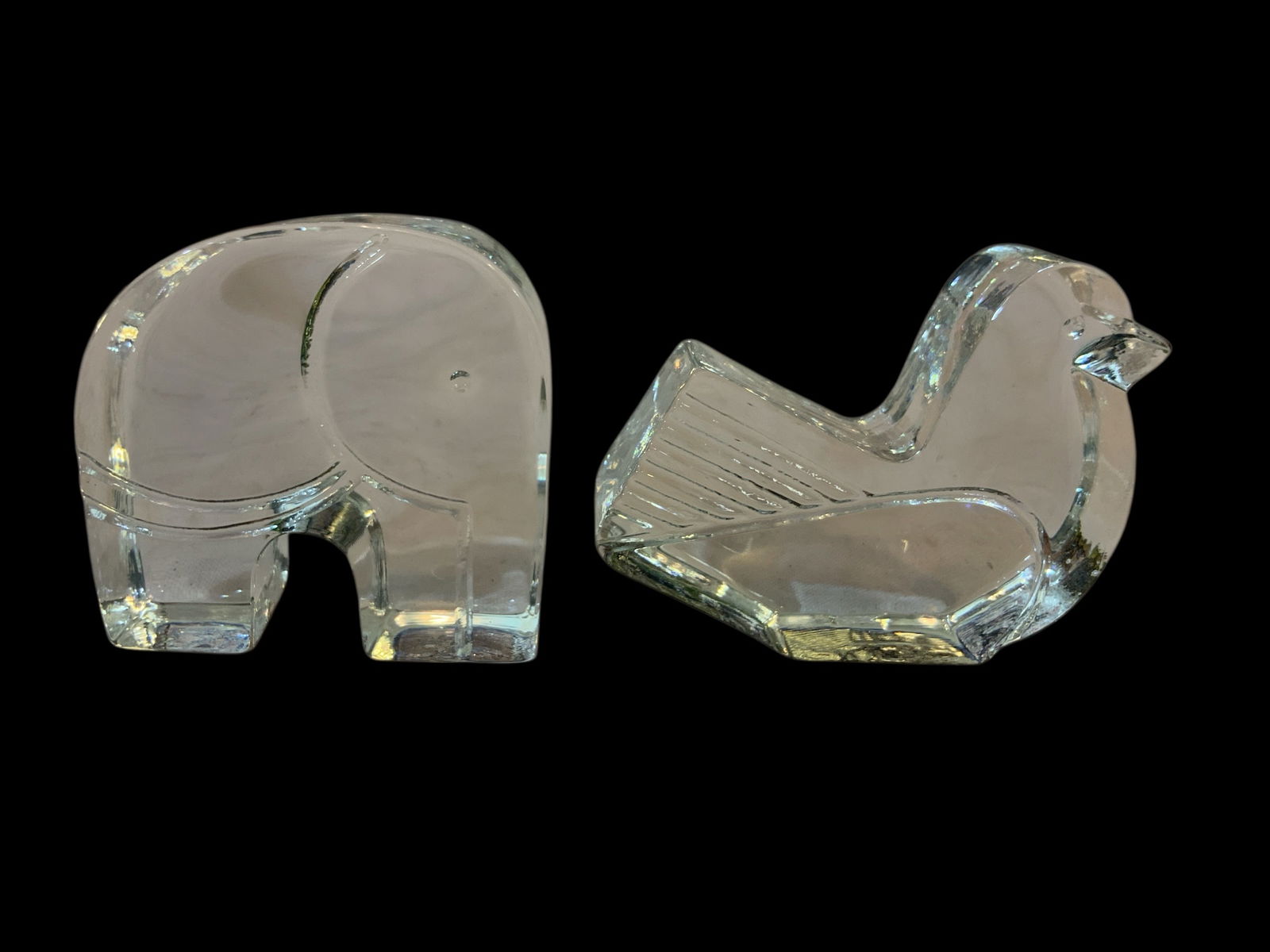 Two Kosta Boda “Zoo Series” Paperweights Elephant & Bird by Bertie Vallien: Clear glass with no issues.Bird is 3 1/2” x 4 1/2”. Total lot weight 3lb