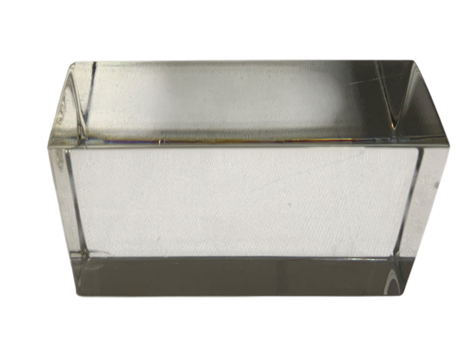 Baccarat Rectagonal Glass Paperweight: Baccarat Rectagonal Glass Paperweight. Good condition. Has a small, intact fracture in one corner and a pinpoint ding at one end. 1 1/8” x 2 1/8” x 3 1/4” 1lb