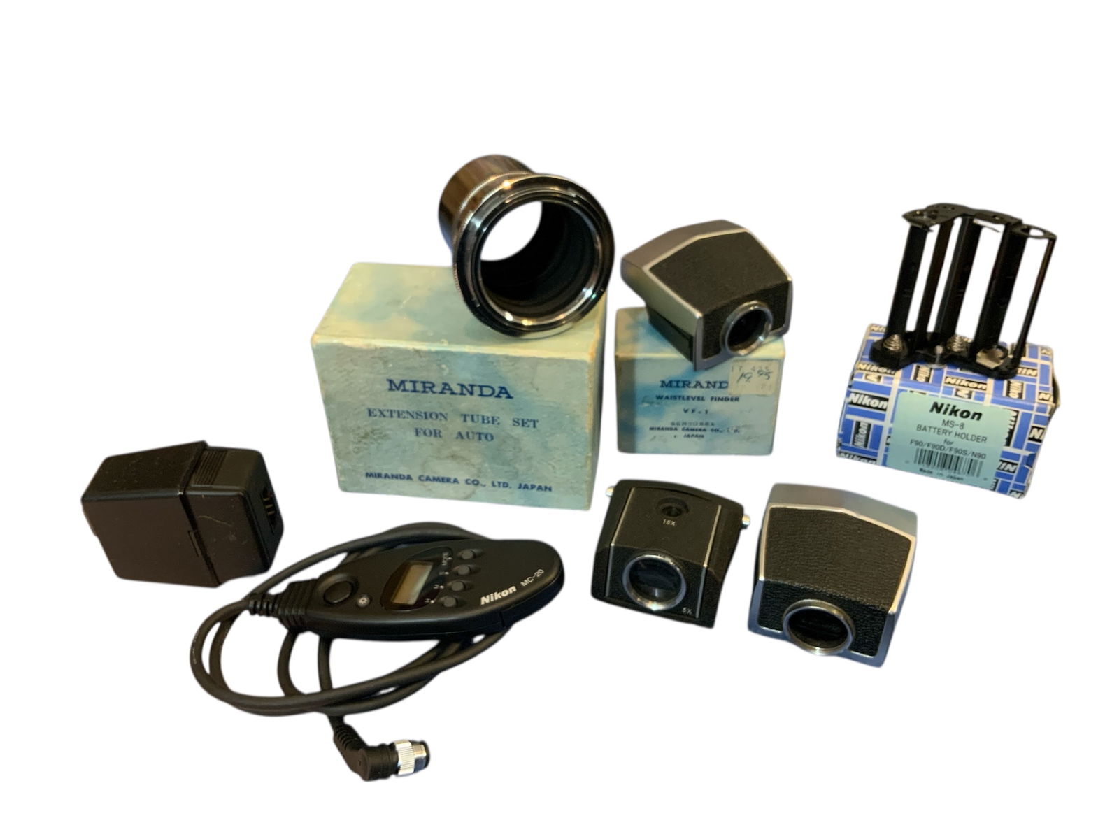 7pc Ensemble Camera / Photography Accessories: 7pc Ensemble Camera / Photography AccessoriesWaist level Finder, Extension Tube Set, Flipflash Extender, Nikon MC-20 and etc. All looks to be in good condition perhaps new, old stock. All untested.4&r