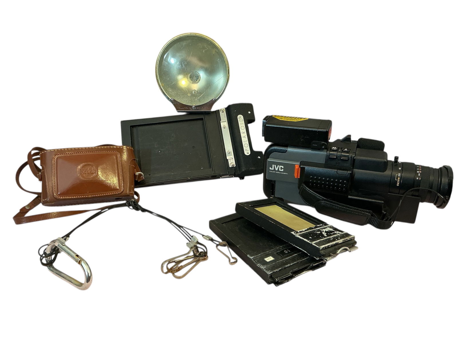 Polaroid Kodak JVC Photography Equipment: Polaroid Kodak JVC Photography EquipmentPolaroid Film Holder 500 used but appears good.Polaroid BC Model 281 Flash -diffuser has scratches and a crack but the unit appears functional overall.JVC Color