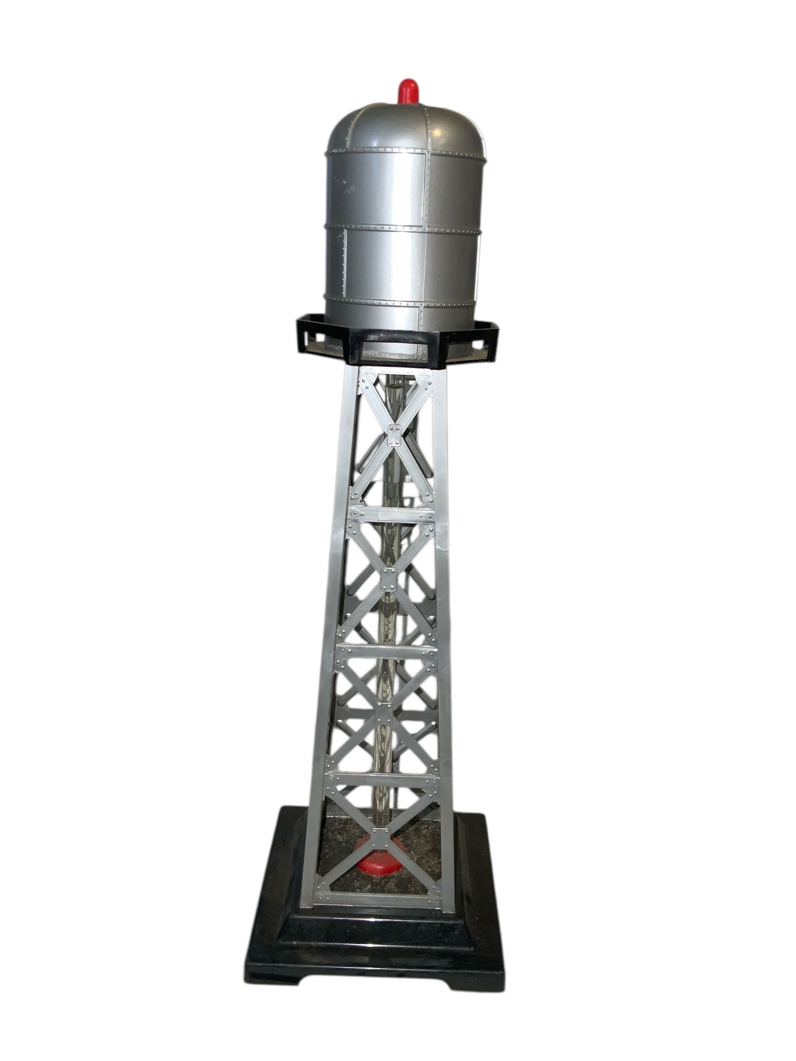 Vintage Plastic Marx Illuminated Bubbling Water Tower. O-gauge: Vintage Marx Illuminated Bubbling Water Tower. O-gauge. Lights from the bottom with the heat creating a bubbling effect in the liquid-filled tube. Untested. Dusty. Just over 14” tall.