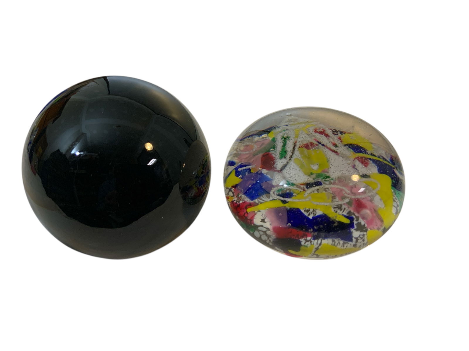Pair Art Glass Paperweights: Pair Art Glass Paperweights . Manufacturer is unknown. Possibly Murano. There are bruises on the Scrambled one which is just over 3” diameter. The black one is approx 3” tall and in very