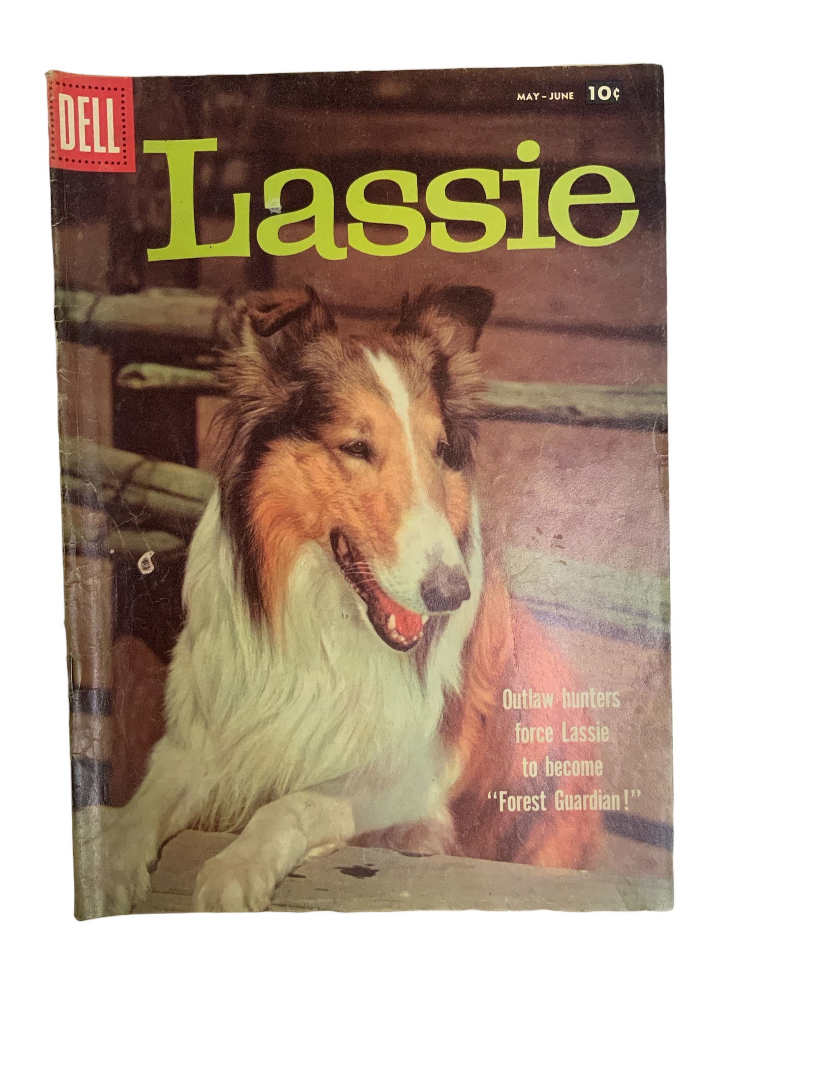 Lassie Comic Dell 10cent May-June 1958: Lassie Comic Dell 10cent May-June. Staples intact. No cut-outs. As pictured. Condition report is our opinion, not an official grade.?..***PLEASE READ***Shipping for this lot is available ONLY THROUGH