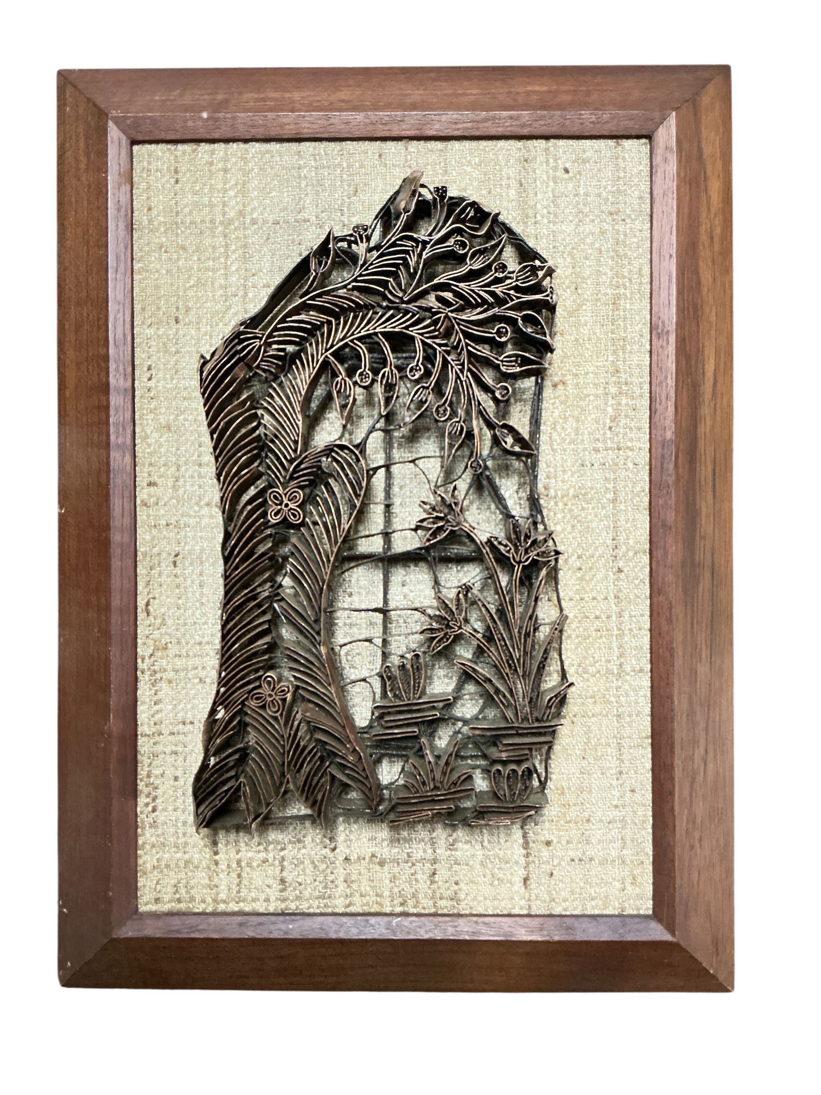 Framed Handmade Copper Batik Stamp: This is a framed traditional handmade copper batik stamp, also known as a 'tjap' or 'chap'. These unique artisan tools were historically used to stamp wax patterns onto fabric for creating intricate