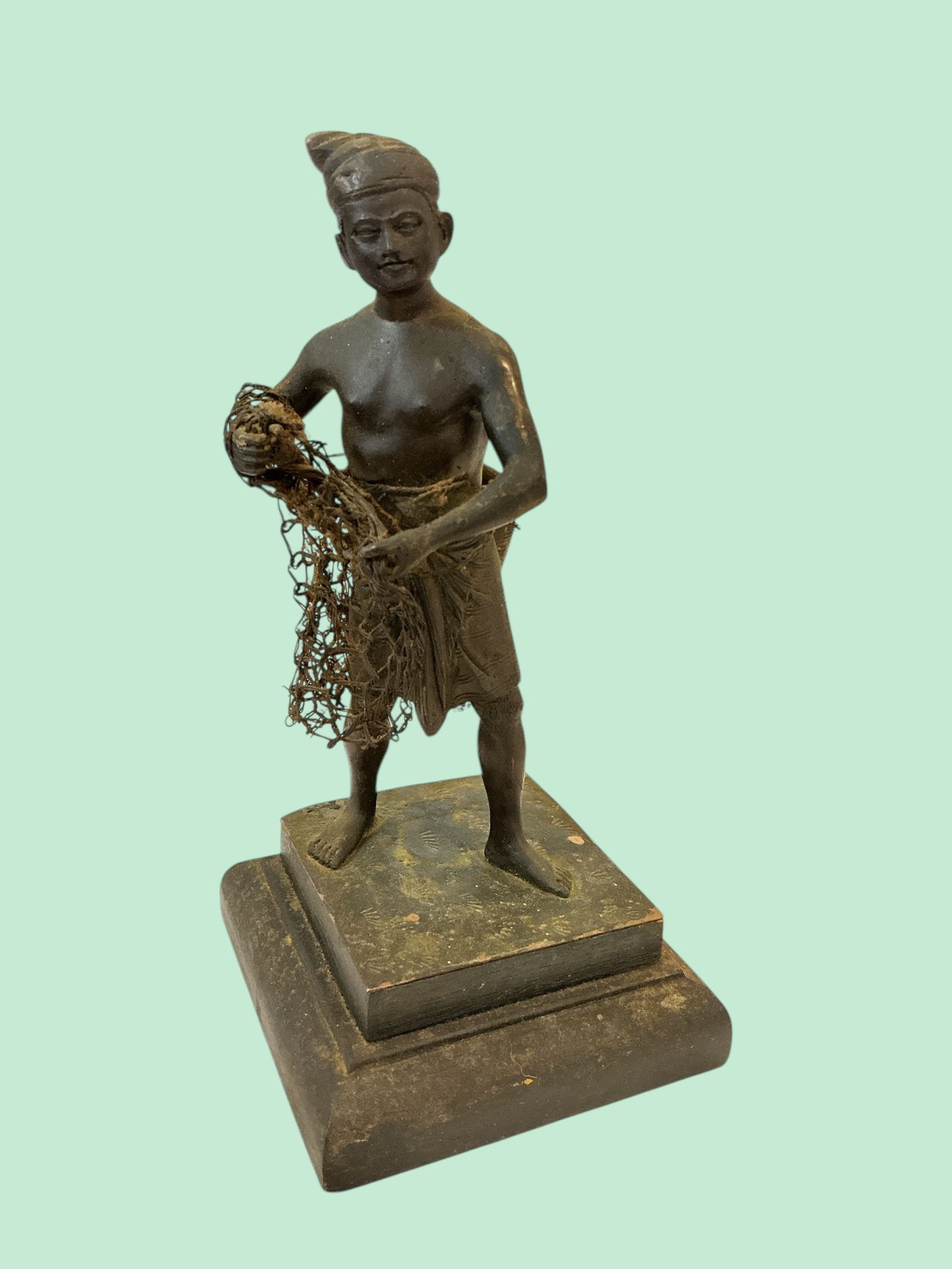 Bronze Depiction of a Fisherman Holding a Net and Creel (1 of 4)