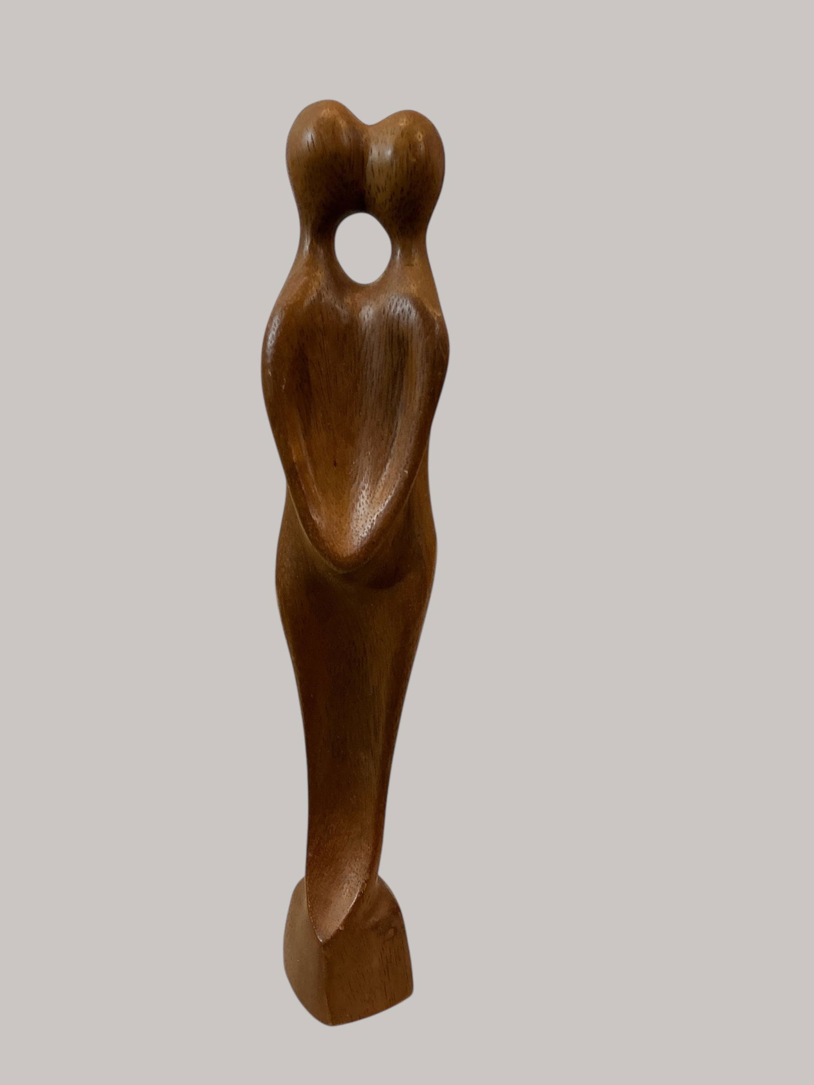 Wooden ‘Lovers Sculpture’: Wooden Lovers Sculpture.The image displays a vintage, mid-century modern, biomorphic wooden sculpture, often referred to as "The Lovers" sculpture. There are no labels or markings.11” tall and r