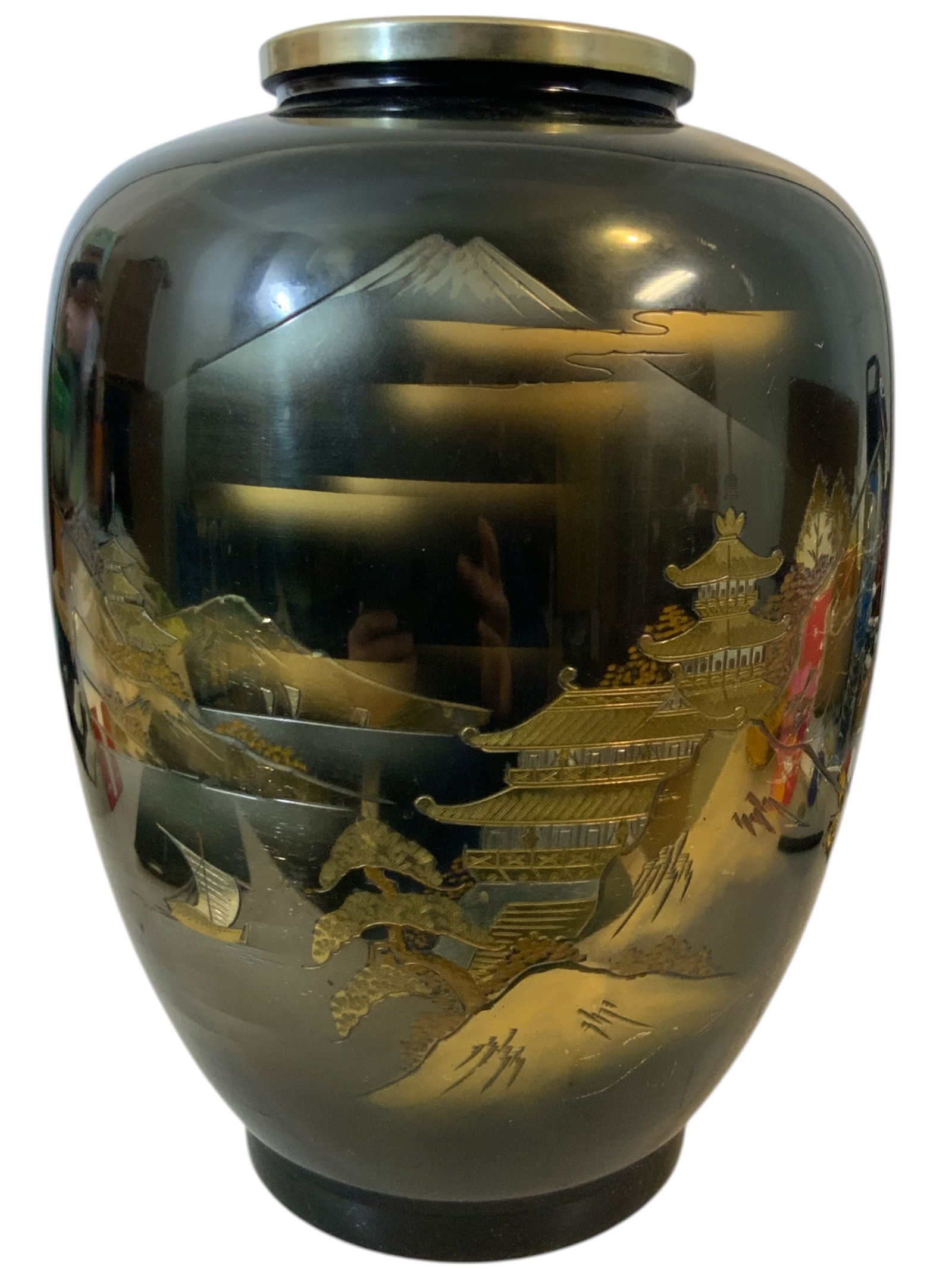 Large Asian Metal Vase: Large Asian Metal Vase. Body is a nonmagnetic metal and has a dent low, near the base. There are some scratches in the coating but the artwork has escaped damage. The artwork is raised as if silver an