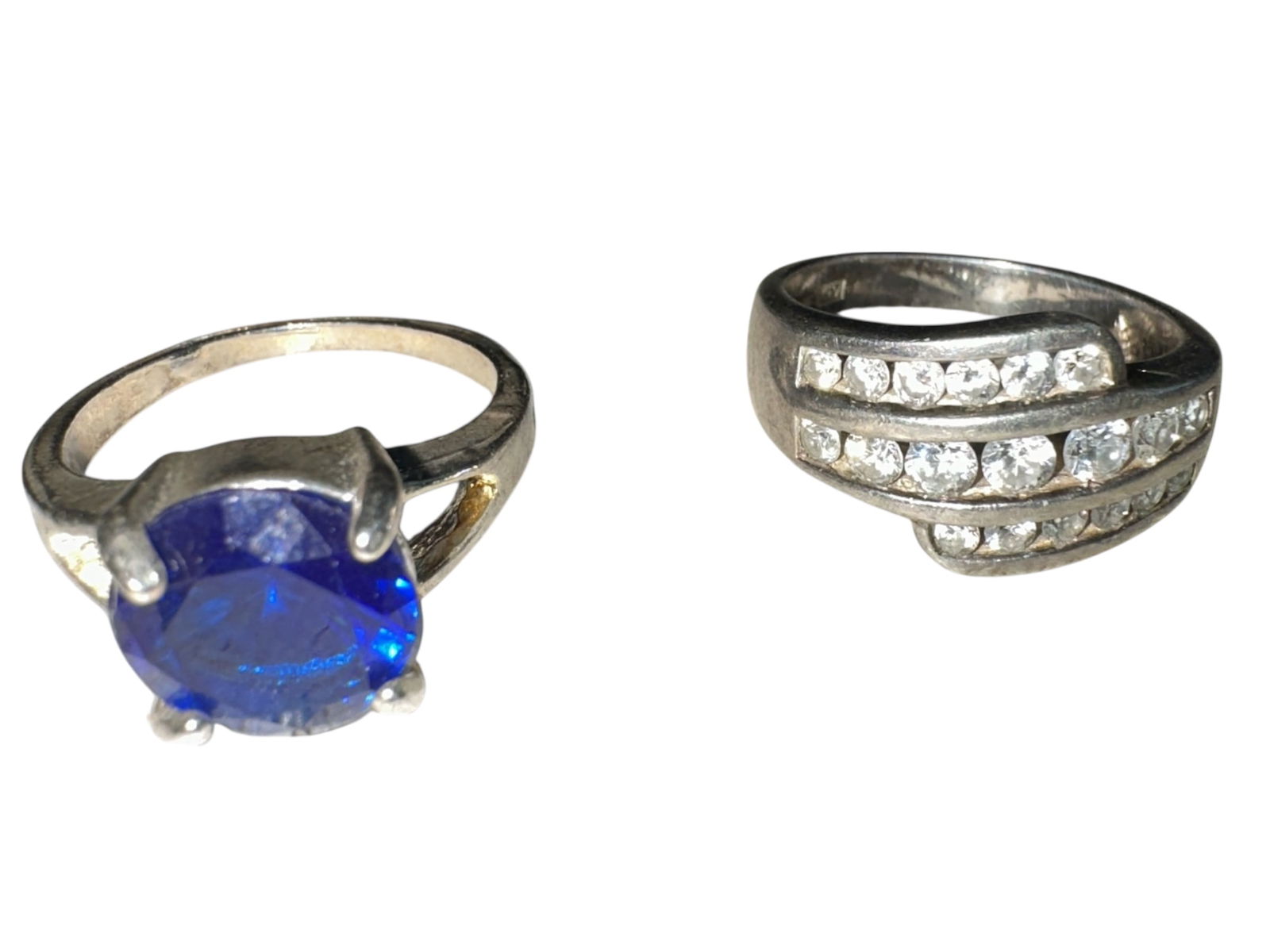 (2) .925 Sterling Silver Rings Art Deco CZ and Faceted Blue Stone both Size 7: Two Sterling Silver Rings Art Deco CZ and Faceted Blue Stone Marked 925 Size 7.================================= PLEASE READ =============================Shipping for this lot is available ONLY