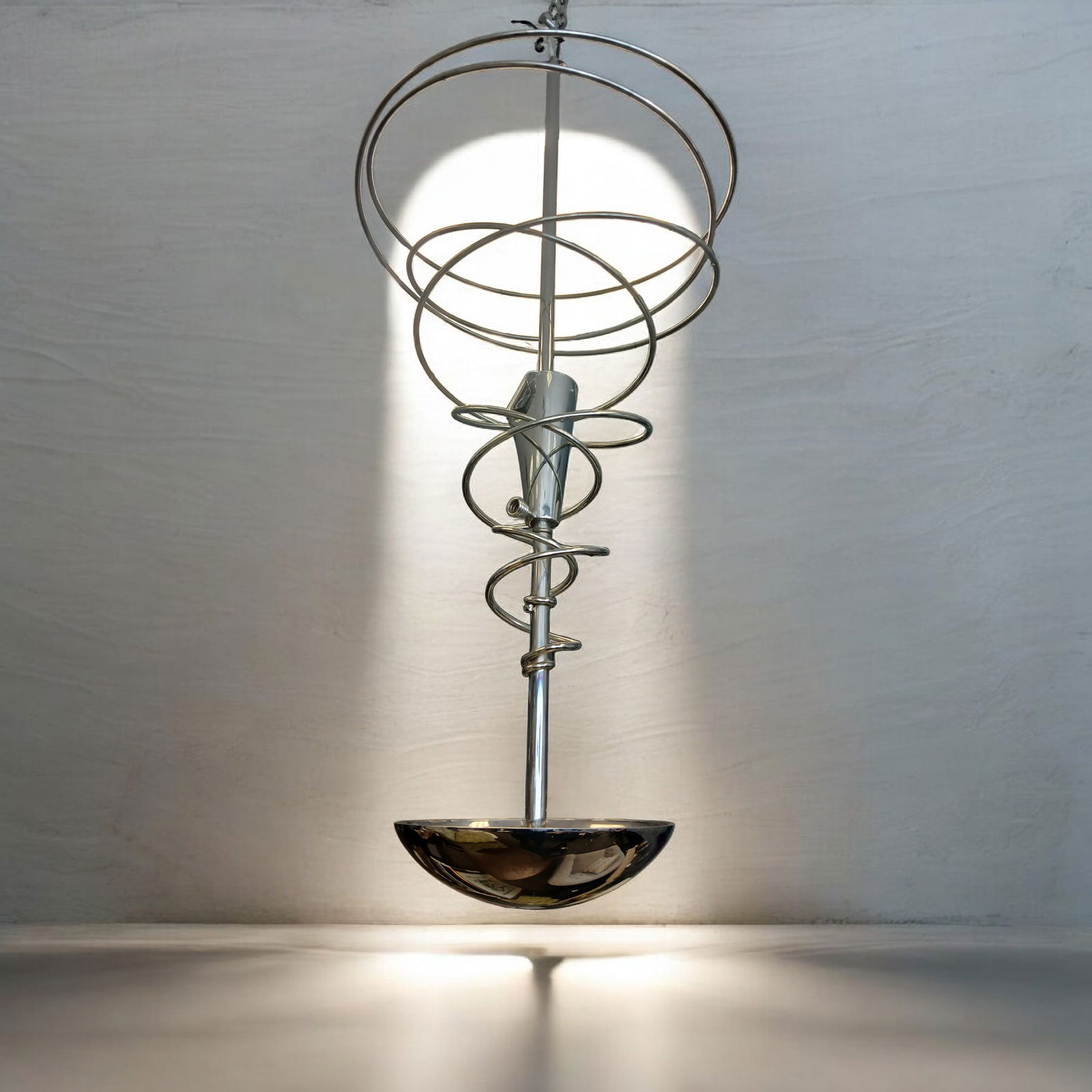 Designer ultra modern chrome hanging chandelier: Designer ultra modern chrome hanging chandelier approximately 36 inches tall good condition ready to hang..================================= PLEASE READ =============================Shipping for this