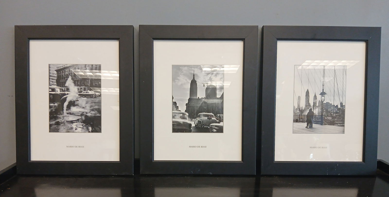 (3) Mario DeBiasi framed photo art: (3) Mario DeBiasi framed photo art taken by him on tour of nyc 1955 they measure 19 inches tall by 15 inches wide they are all in good condition..================================= PLEASE READ