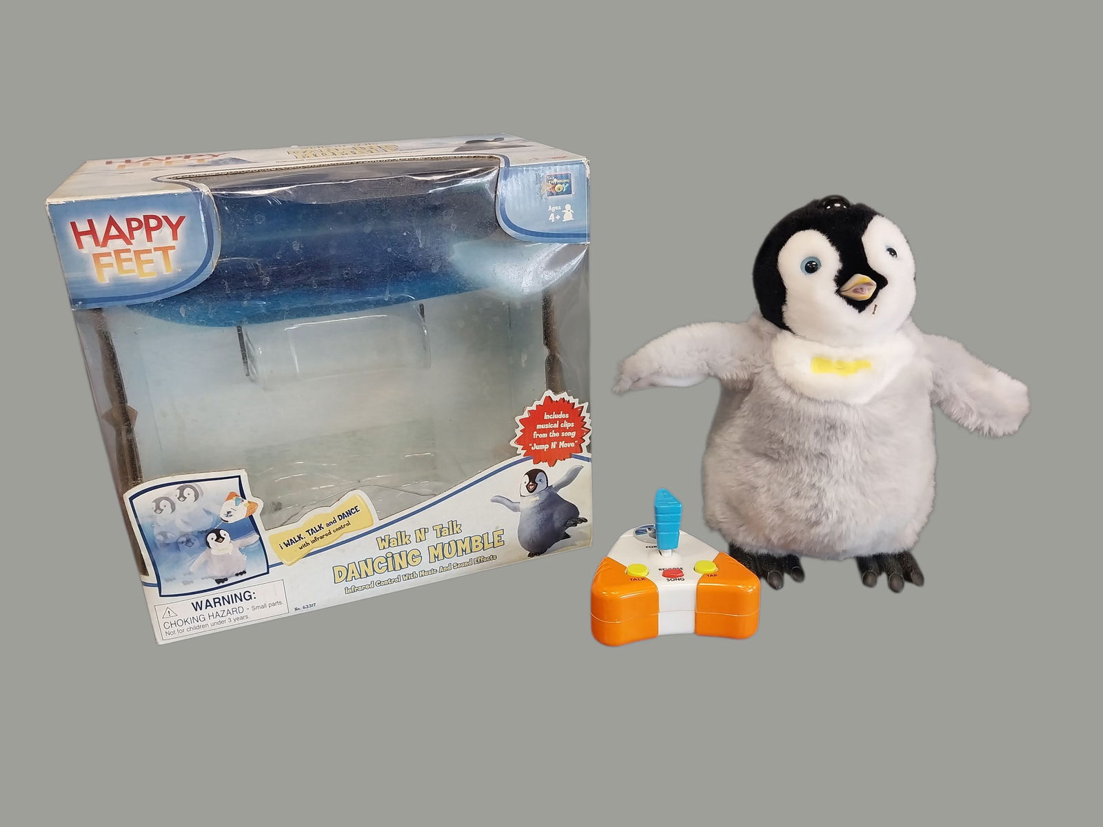 Walking N' Talking Mumble From Happy Feet: Walking N' Talking MumbleFrom Happy Feet 10 inches tall out of Box has remote control UNTESTED.================================= PLEASE READ =============================Shipping for this lot is avail