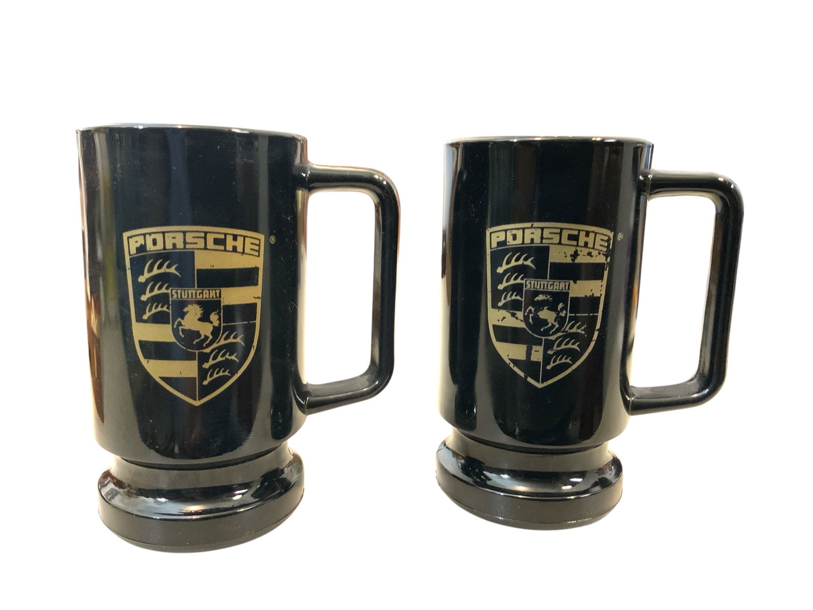 Black Glass Porsche Coffee Mugs 2pcs: Black Glass Porsche Coffee Mugs 2pcs. ================================= PLEASE READ =============================Shipping for this lot is available ONLY THROUGH LIVESHIPPING. We advise all bidders