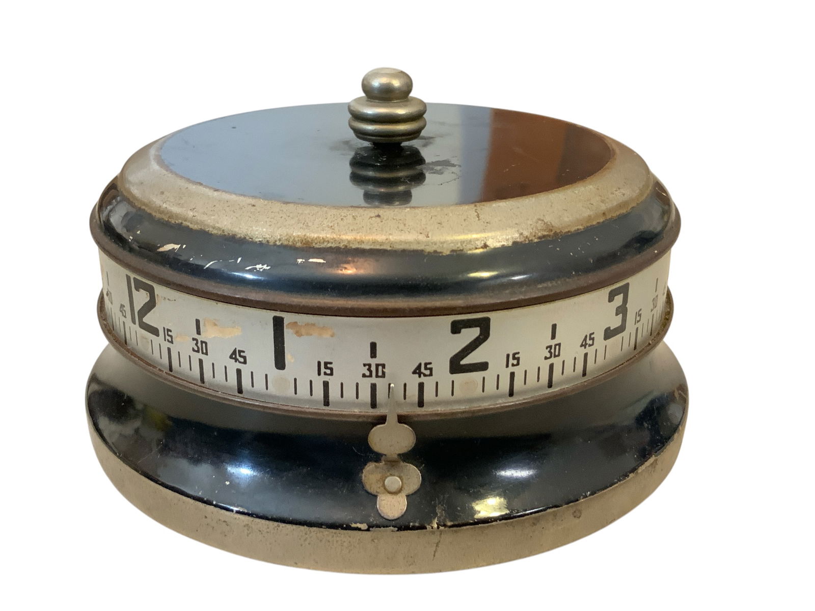 Vintage Lux "Mystery" Rotary Tape Measure Clock: Vintage Lux "Mystery" Rotary Tape Measure Clock. Winds and 'tic-toes'. Unsure if it keeps time. 4 1/2" diameter. ================================= PLEASE READ =============================Shipping for