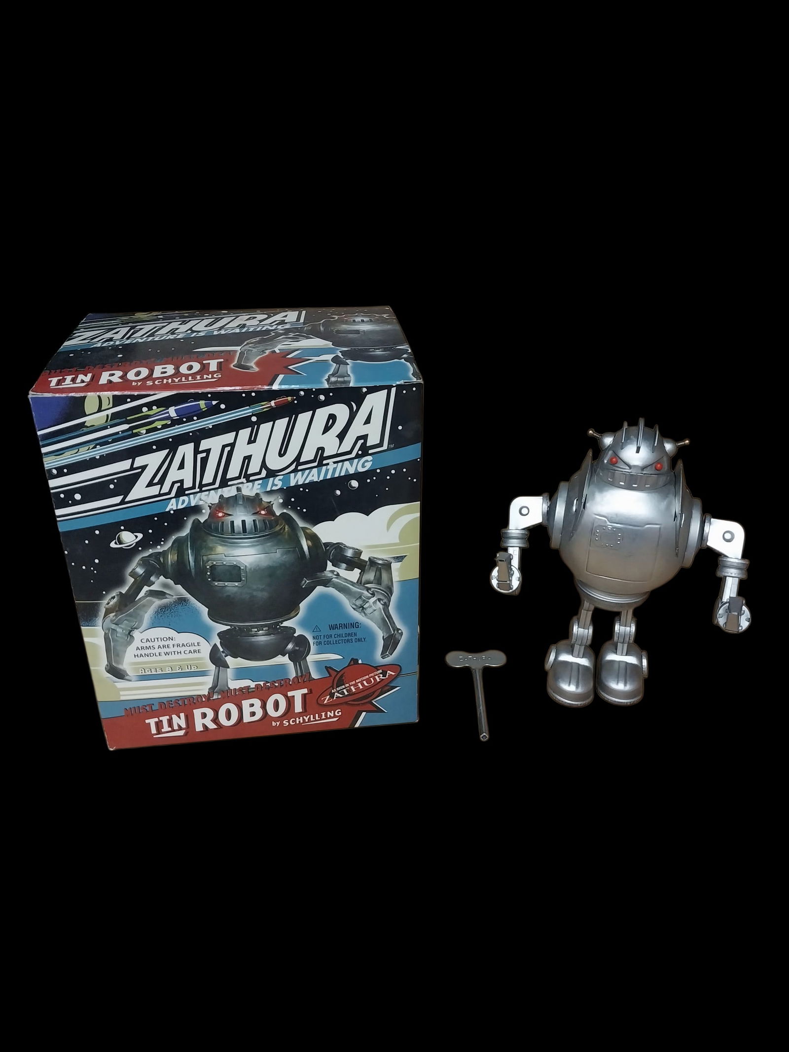 Schylling Zathura Tin Wind Up Robot 2005: Schylling Zathura Tin Wind Up Robot 2005 Works as it should winds up and walks Robot and Box are in great condition. ================================= PLEASE READ =============================Shipping