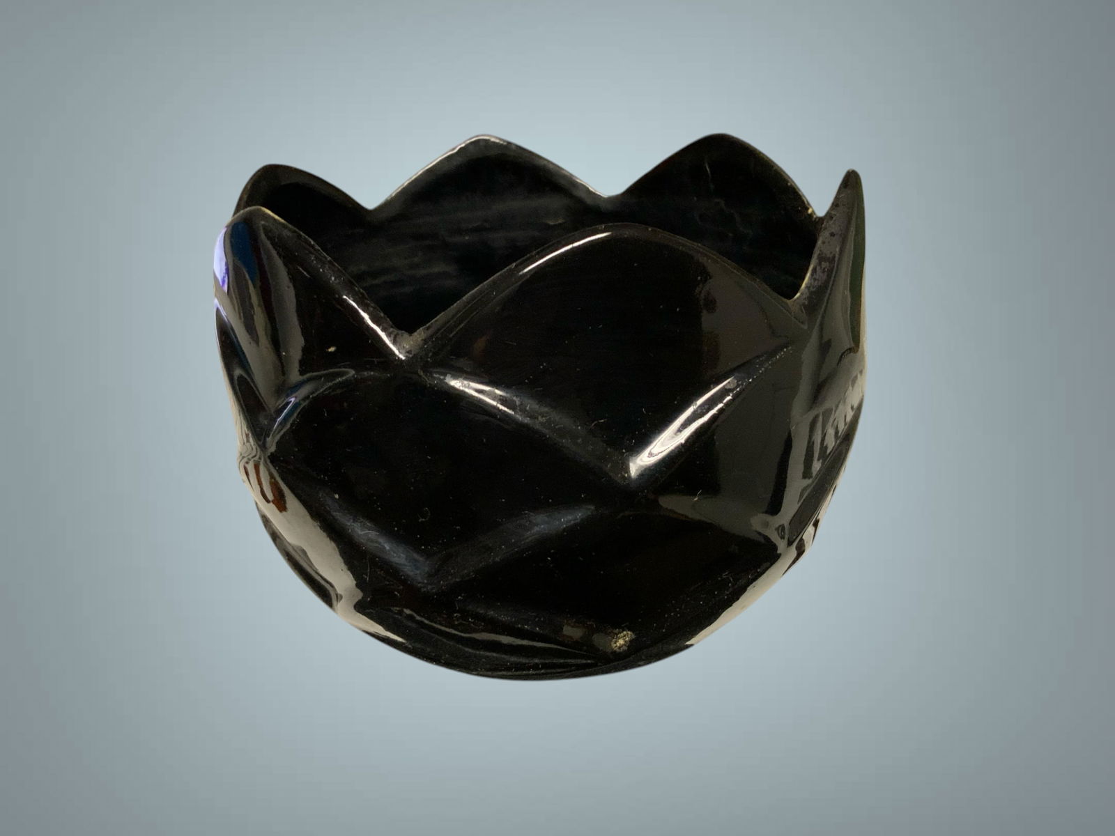 Mid-century McCoy Black Lotus Power Planter / Vase: Mid-century McCoy Black Lotus Power Planter / Vase. Has a few tiny flea bites in the glaze(see photo #2 for example). 5" tall, 6 3/4" diameter. ================================= PLEASE READ ==========