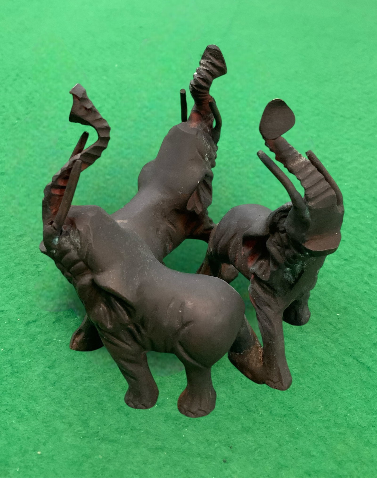 Trio of Metal Elephants in a Circle (1 of 3)