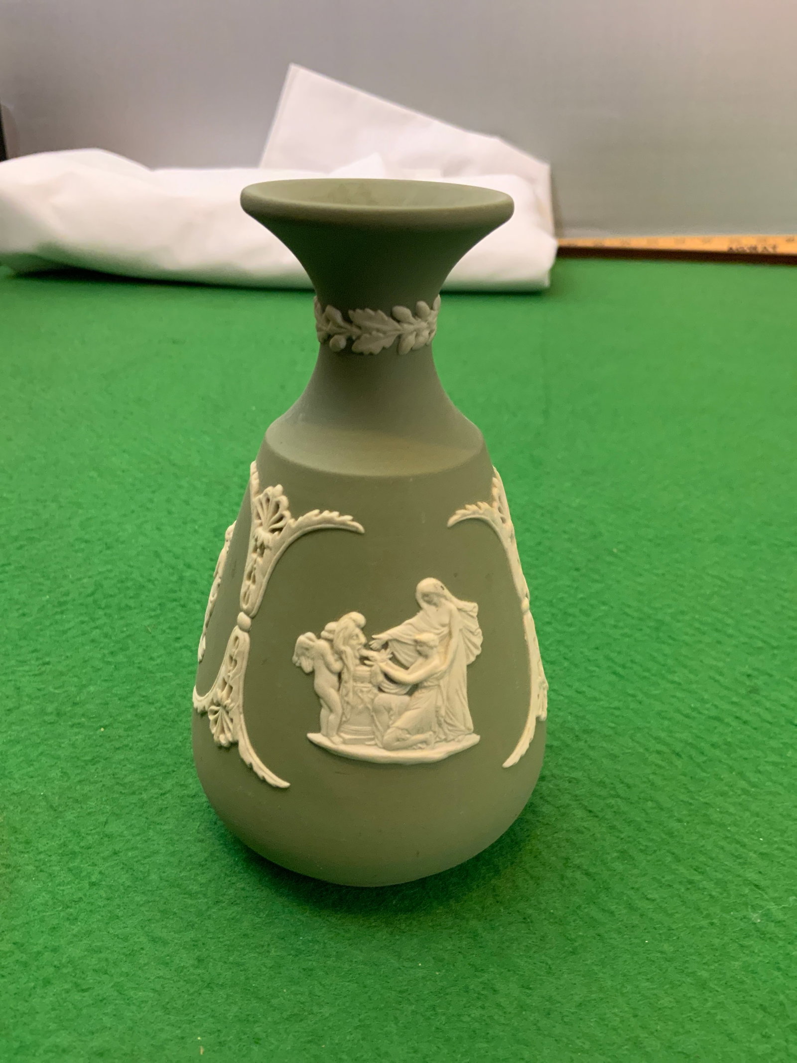 Vtg Green Celadon Jasperware Bud Vase Wedgewood Made in England: Vtg Green Celadon Jasperware Bud Vase Wedgewood Made in England. 2 3/4" diameter 5" tall. .>>>>>>>>>>>>>>READ—-READ—-READ—-Shipping for this lot is available ONLY THROUGH LIVEAUCTIONEERS/LIVESHI