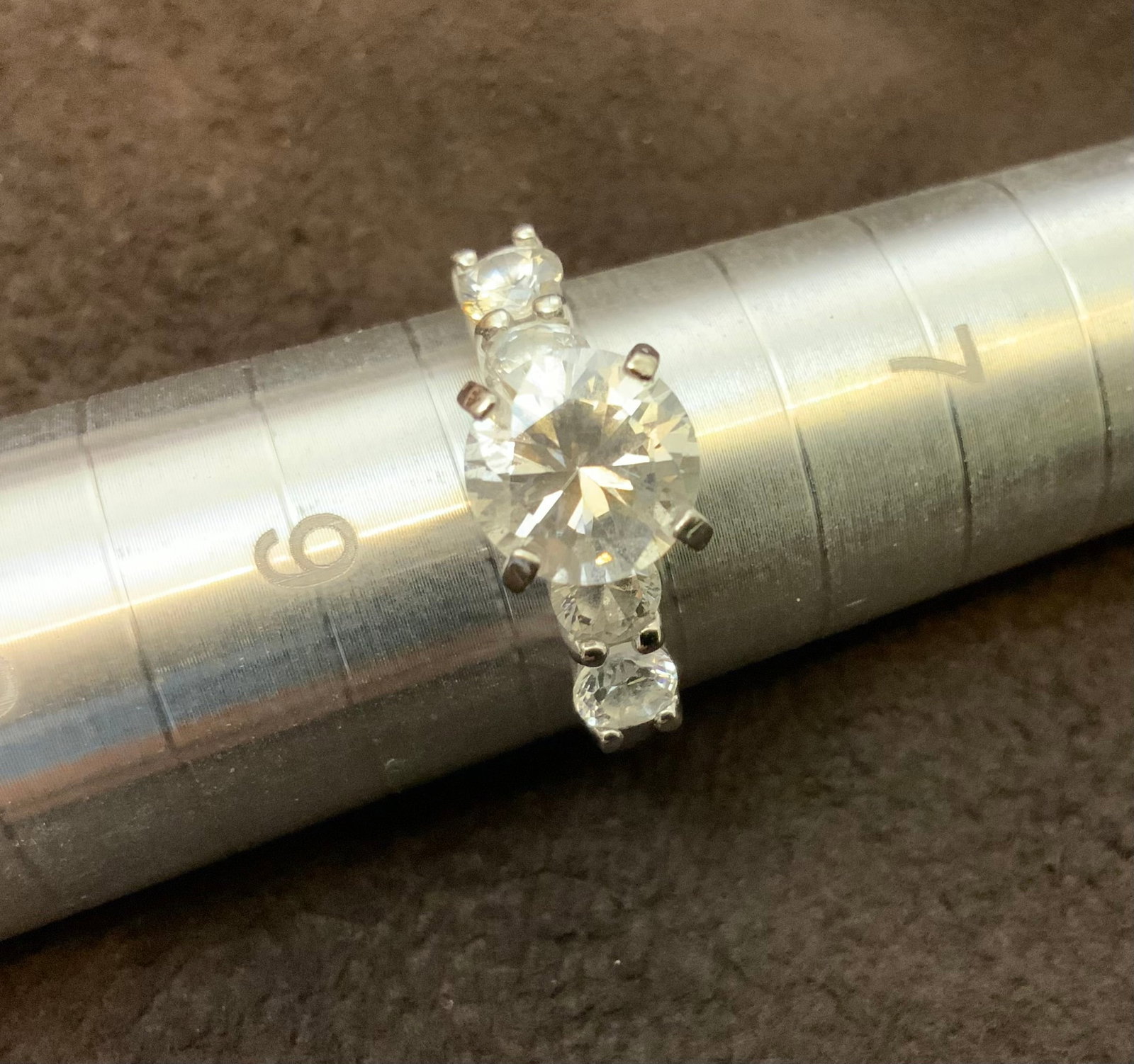 Five-stone 925 Engagement Ring Size 8: Five-stone 925 Engagement Ring Size 8. Marked 925. .>>>>>>>>>>>>>>READ—-READ—-READ—-Shipping for this lot is available ONLY THROUGH LIVEAUCTIONEERS/LIVESHIPPING. We advise all bidders to obtain