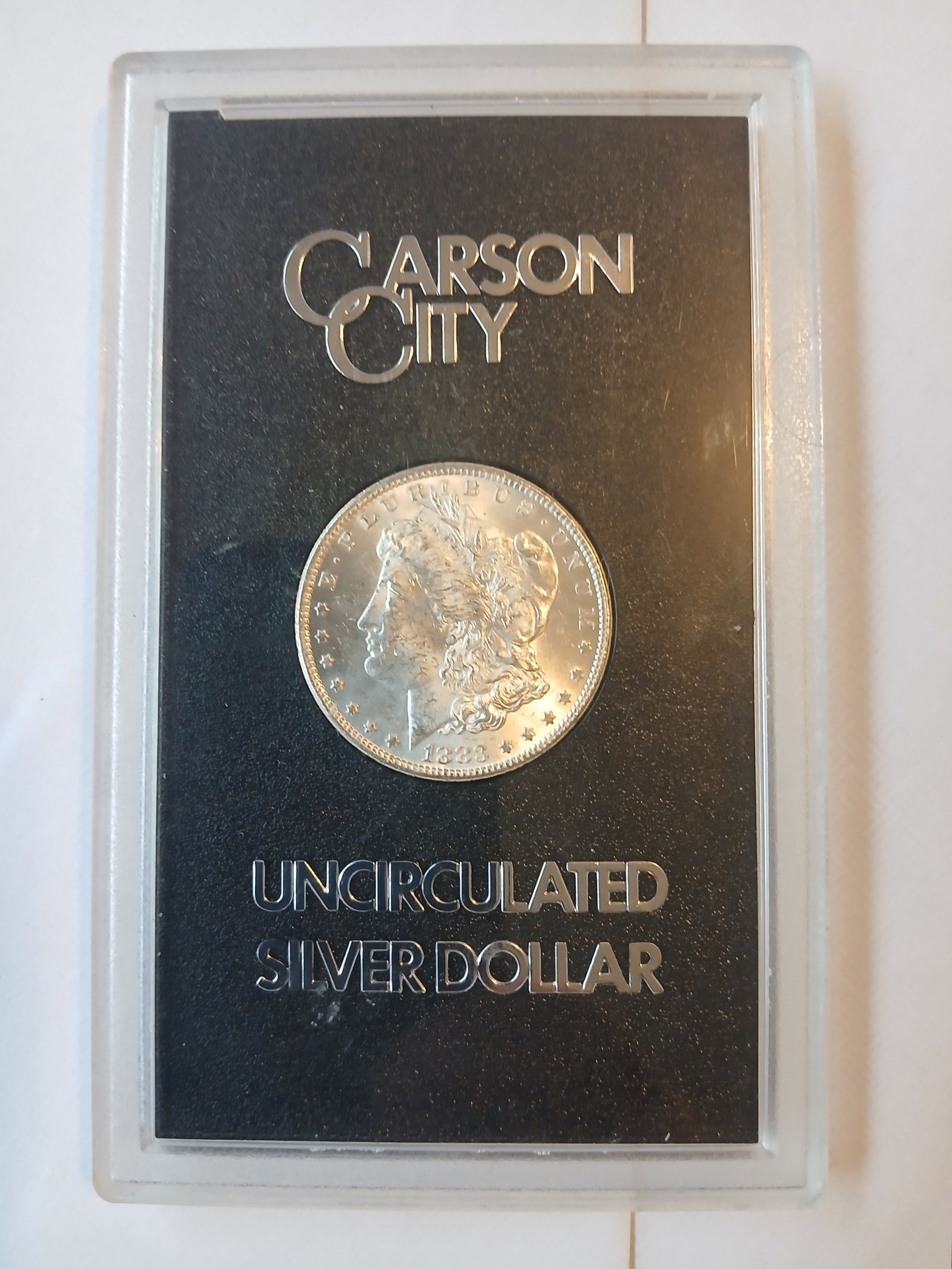 1883 Carson city silver uncirculated U.S coin (1 of 3)