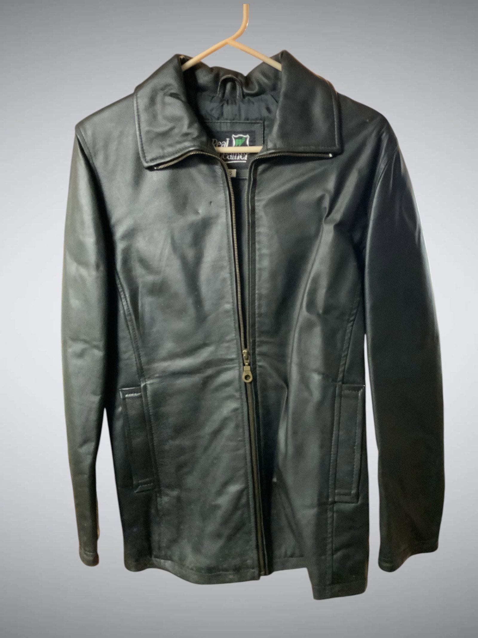 Real Leather Brand Cowhide Zipper Front Jacket Size S.: Real Leather Brand Cowhide Zipper Front Jacket Size S. Came in as New, old stock. No tags. Does look like it hasn't been worn but has some spots, likely from storage, and probably should be cleaned. 1