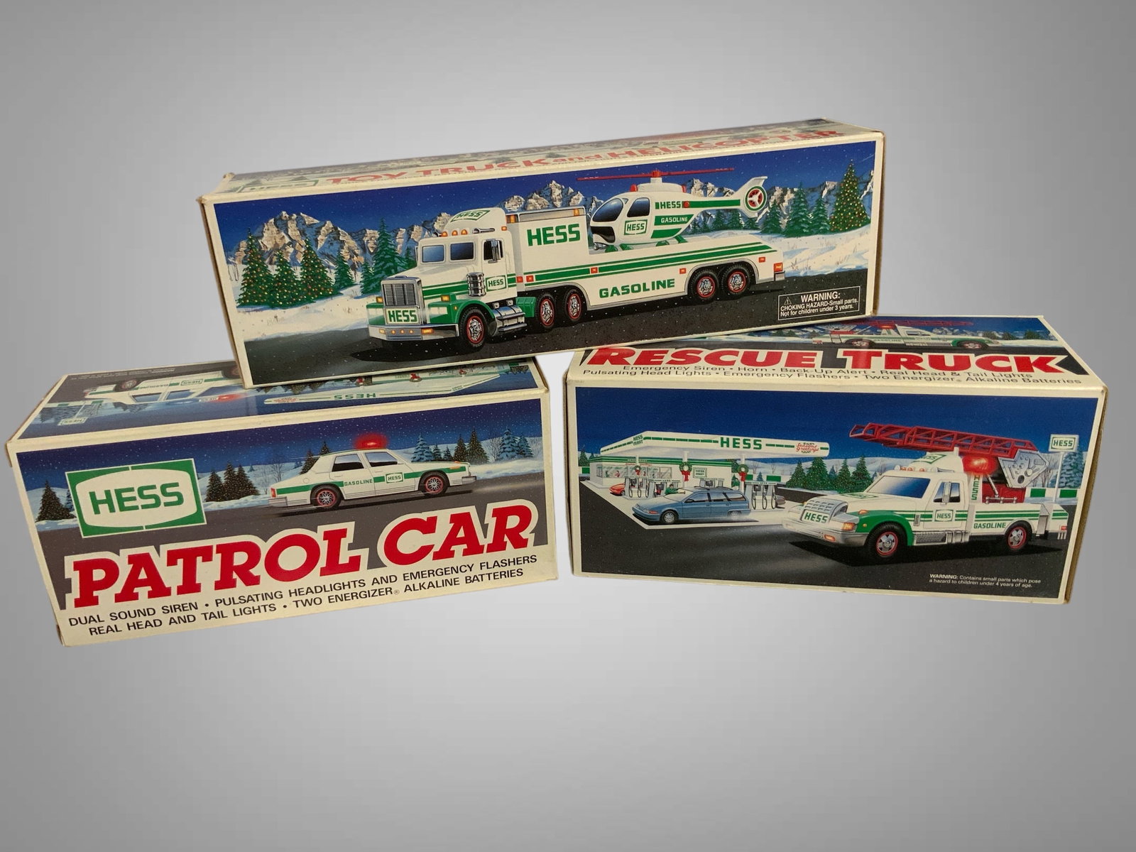 (3) HESS Toy Trucks 1993 Patrol Car 1994 Rescue Truck 1995 Toy Truck and Helicopter (1 of 4)
