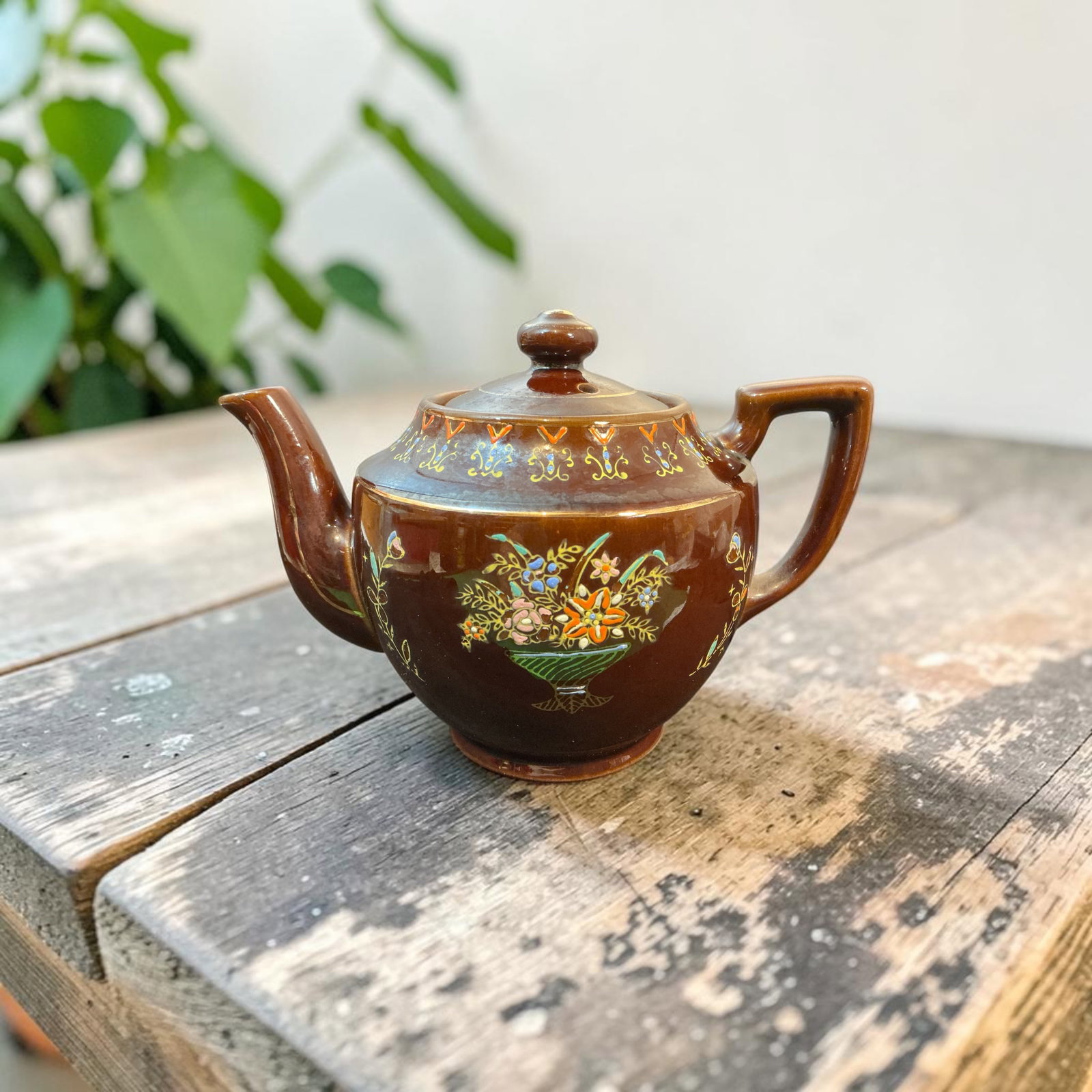 Vintage Asian Moriage Teapot: Vintage Asian Moriage Teapot. Handpainted floral decoration. 7" across the spout and handle. .>>>>>>>>>>>>>>READ—-READ—-READ—-Shipping for this lot is available ONLY THROUGH LIVEAUCTIONEERS/LIVE