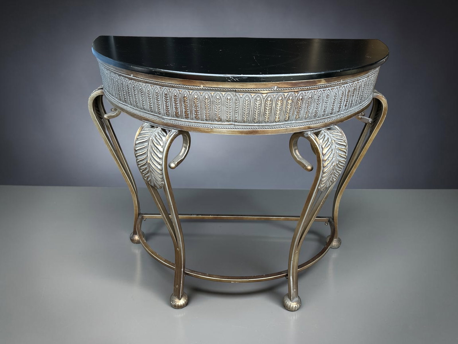 Vintage Deco79(attrib.) Half Moon Console Table: Vintage Deco79(attrib.) Half Moon Console Table. References attribute this piece to Deco79. There are no labels or marks to verify this. Metal legs and frame. Composite top has some scratches. Top is 