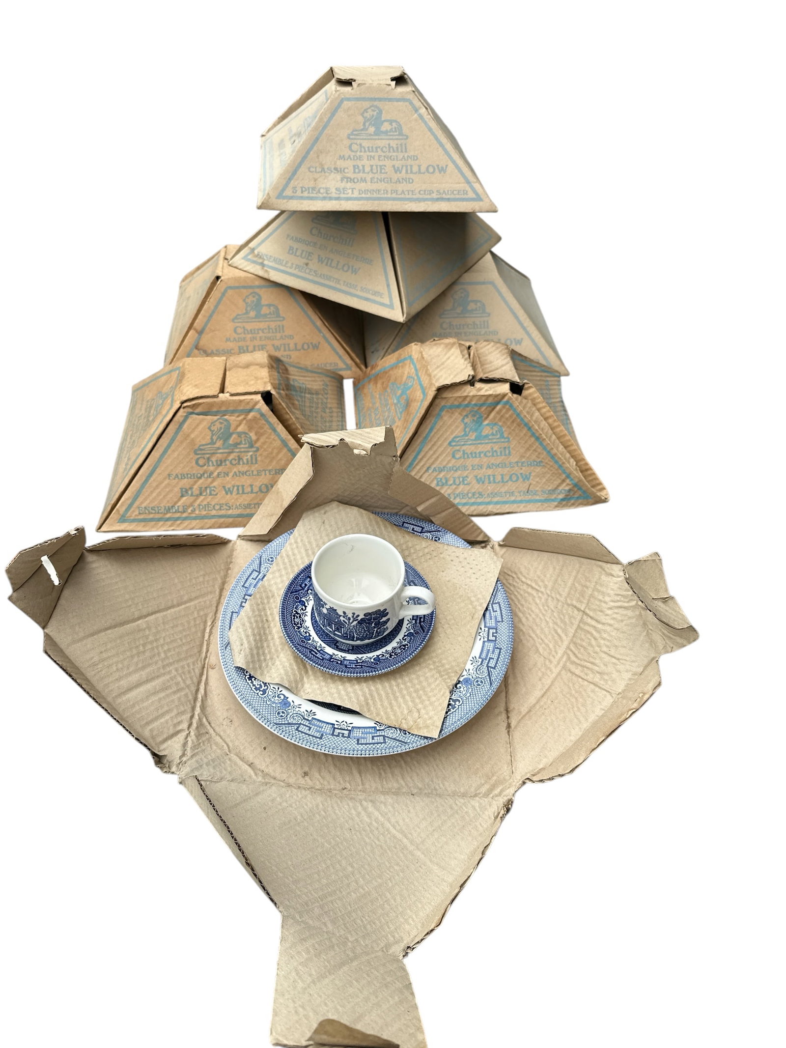 (7) 3pc Sets Blue Willow New in Package Churchill Staffordshire England: (7) 3pc Sets Blue Willow New in Package Churchill Staffordshire England. Cup, Saucer, and Dinner Plate in each set. Has been in storage many years. Packaging is dirty. 4" x 11" x 11" each. ..>>>>>>>>>