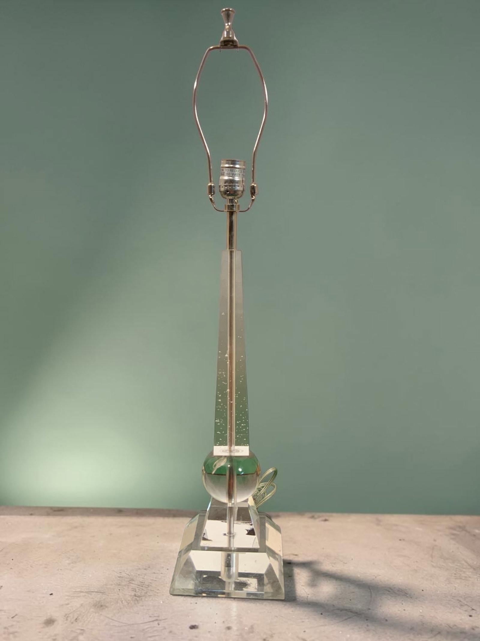 Acrylic Table Lamp Ball and Obelisk Design on Square Base: Acrylic Table Lamp Ball and Obelisk Design on Square Base. In-line switch. 22 1/2”tall to top of socket x 6” square base. .>>>>>>>>>>>>>>READ----READ----READ----Shipping for this lot is av