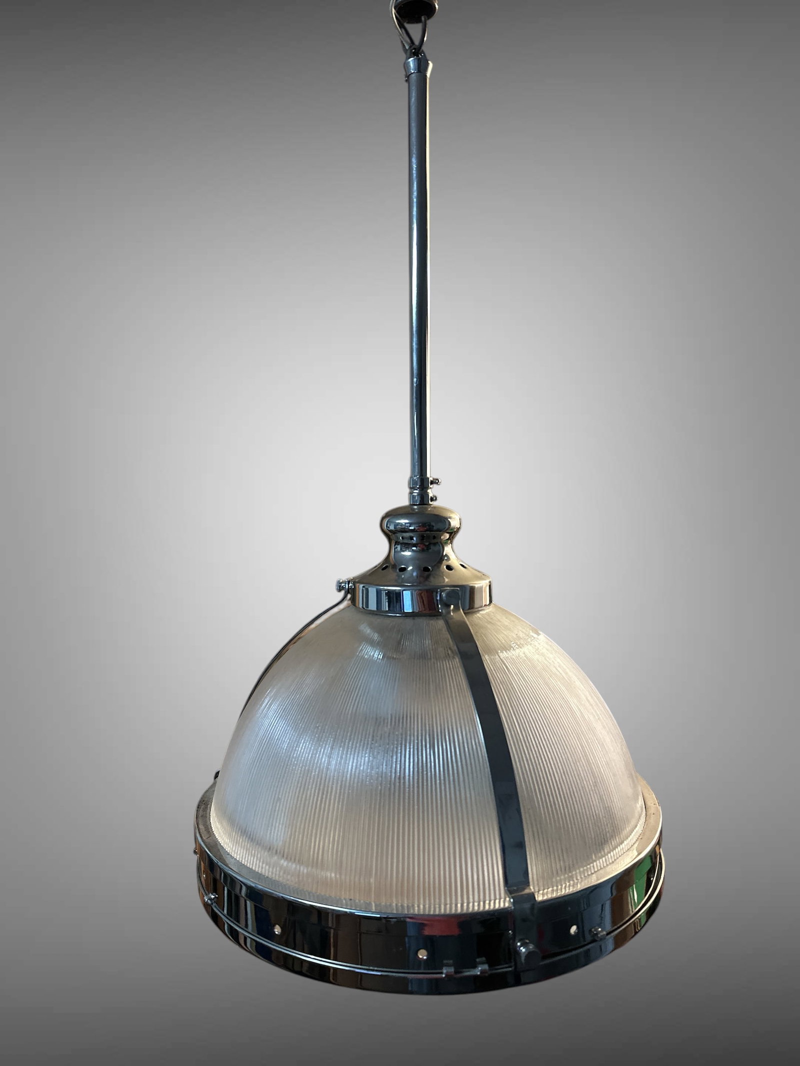 Vintage Pendant 2-bulb Light Ribbed Glass Shade in Polished Metal Frame: Vintage Pendant 2-bulb Light Ribbed Glass Shade in Polished Metal Frame. Ambient lighting during photography made this look like brass. IT IS NOT BRASS. Probably chrome. Installation hardware not incl