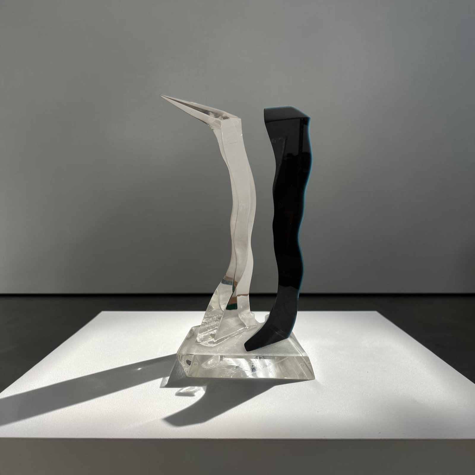 Signed Van Teal Black and Clear Acrylic Sculpture on Geometric Base: Signed Van Teal Black and Clear Acrylic Sculpture on Geometric Base. 9" x 7" x 17"tall .>>>>>>>>>>>>>>>>READ++++++++READ**********READ--------Shipping for this lot is available ONLY THROUGH