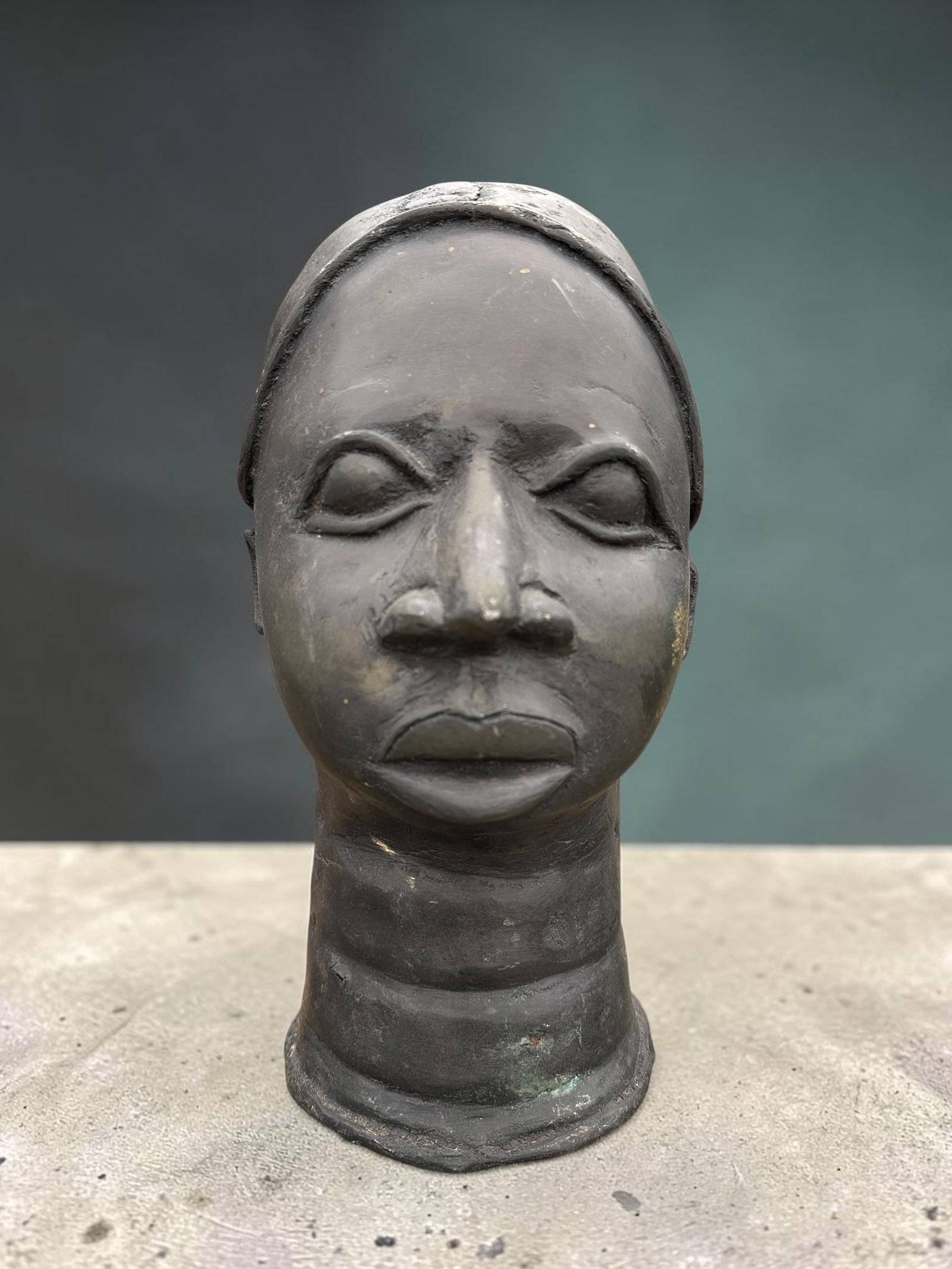 Nonmagnetic Metal Head Sculpture -West African?: Nonmagnetic Metal Head Sculpture -West African?. Has a very nice patina. Hollow and 12”tall. .>>>>>>>>>>>>>>READ—-READ—-READ—-Shipping for this lot is available ONLY THROUGH LIVEAUCTIONEER