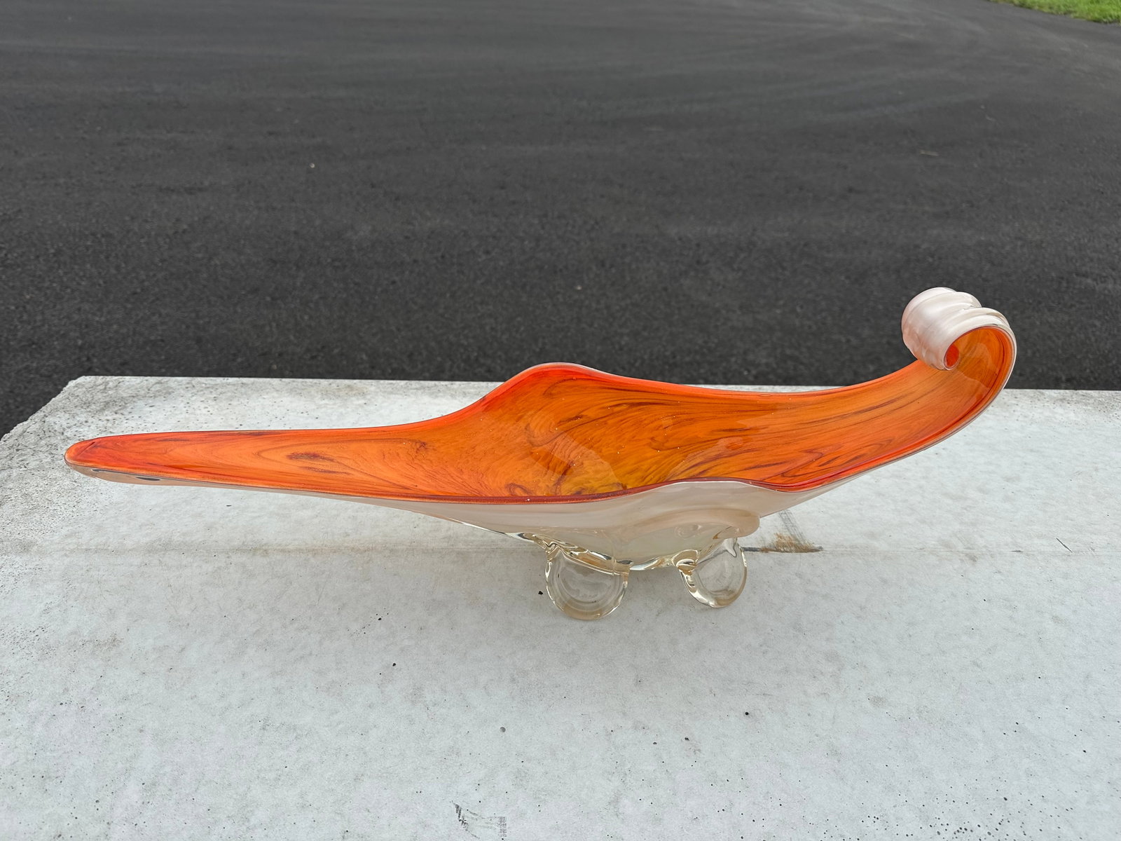 Orange Murano-style Art Glass Footed Bowl: Orange Murano-style Art Glass Footed Bowl. Flowing veins of color under cased glass. 9”tall x 24”wide x 6”front-to-back. .>>>>>>>>>>>>>>READ—-READ—-READ—-Shipping for this lot 