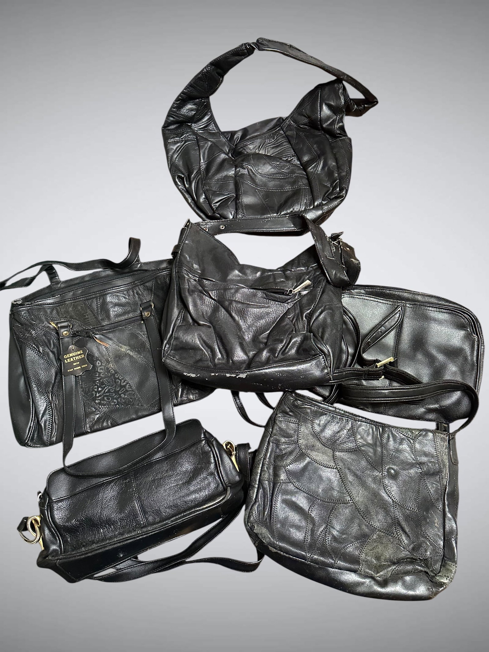 (6) Vintage Leather Hand / Shoulder Bags: (6) Vintage Leather Hand / Shoulder Bags. Largest 3" x 12" x 13". .>>>>>>>>>>>>>>READ—-READ—-READ—-Shipping for this lot is available ONLY THROUGH LIVEAUCTIONEERS/LIVESHIPPING. We advise all