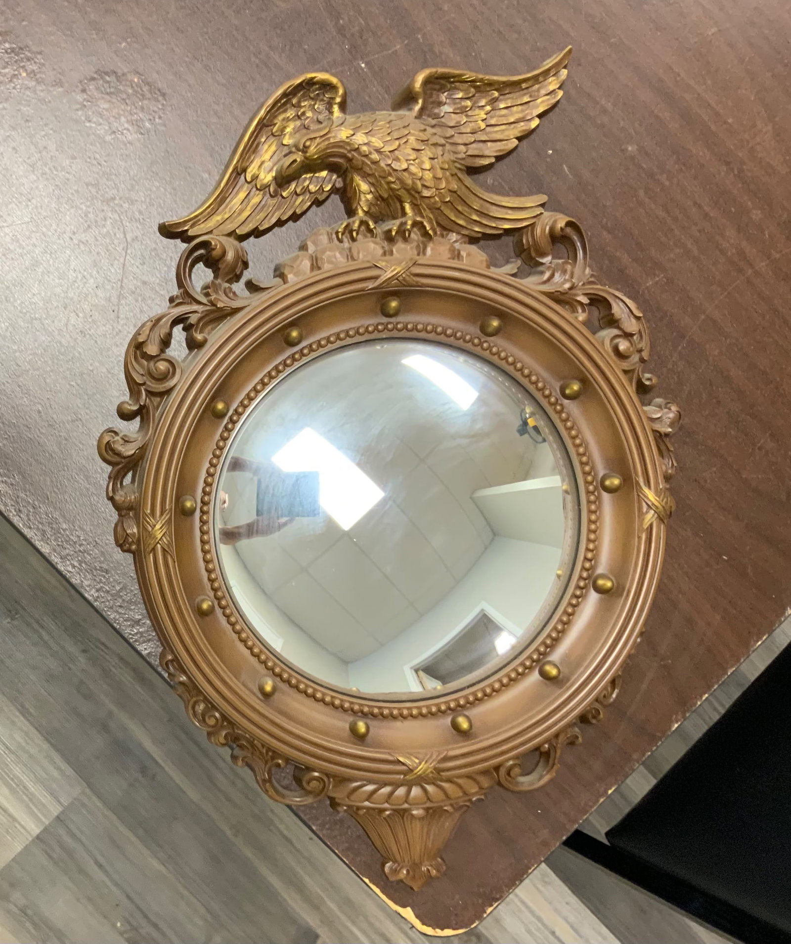 Mid-century Federal-style Porthole Wall Mirror: Mid-century Federal-style Porthole Wall Mirror. Plastic frame-great condition overall. 21tall" x 14 1/2"wide x 2"thick. .>>>>>>>>>>>>>>READ—-READ—-READ—-Shipping for this lot is available ONLY T